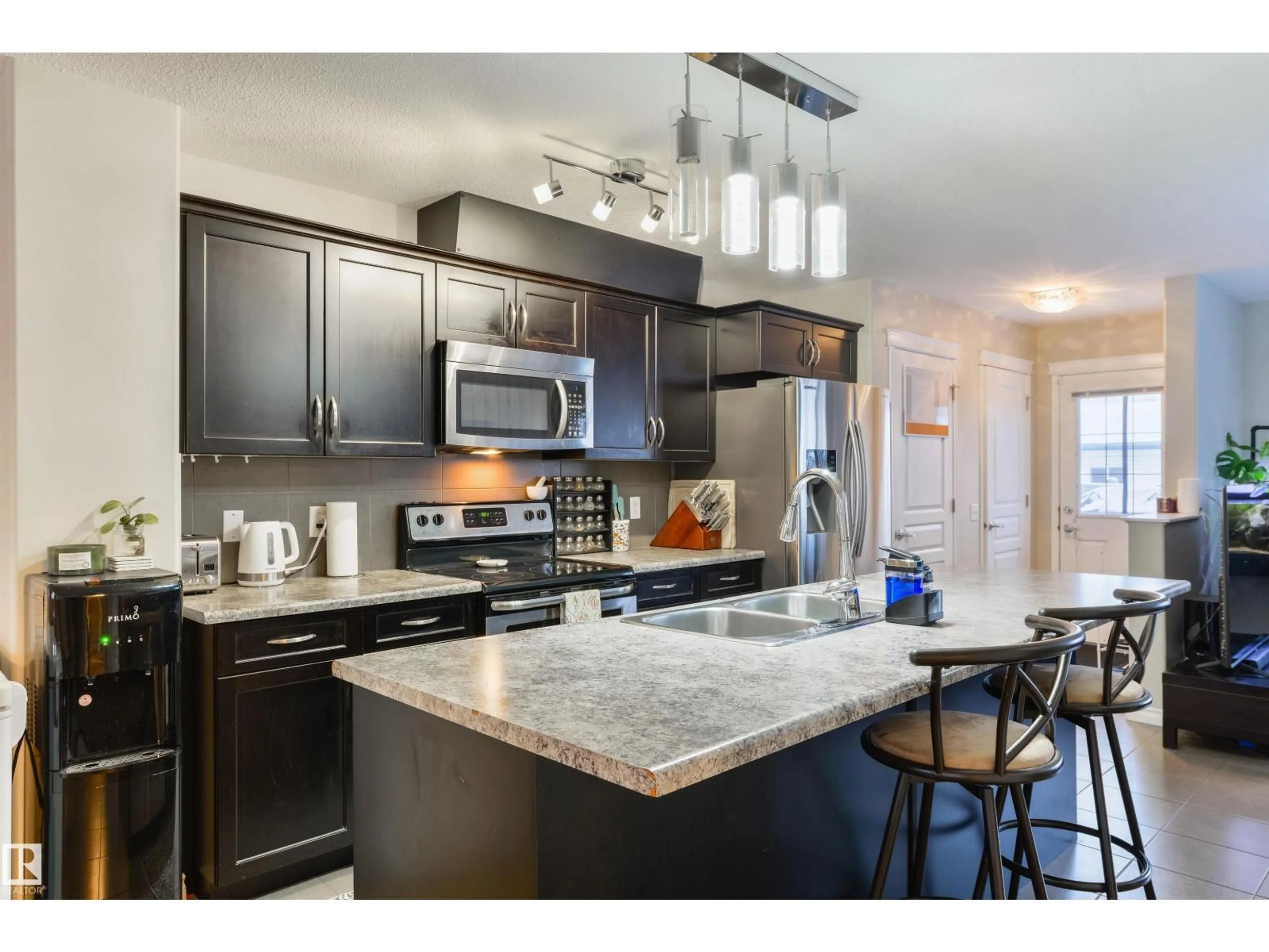 Open concept kitchen, ceramic/tile floor for 346 SECORD BV, Edmonton Alberta T5T5X9