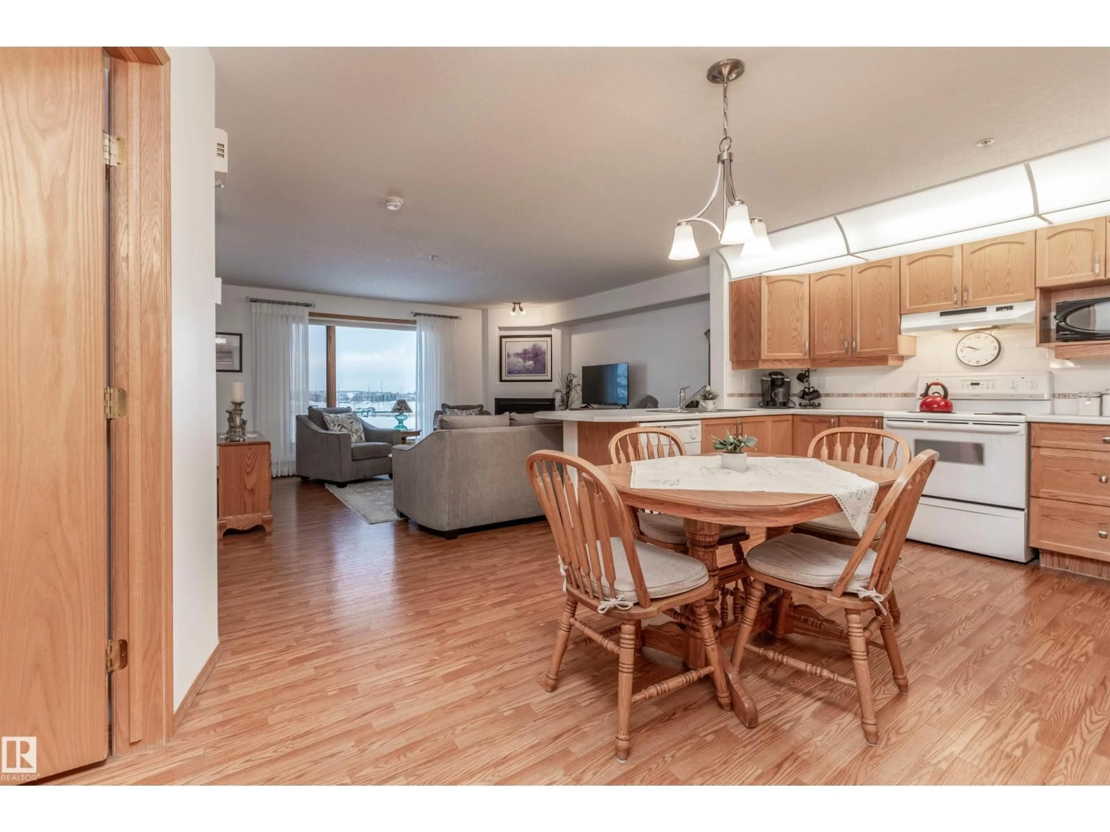 Open concept kitchen, wood/laminate floor for 200 - 134 BETHEL DR, Sherwood Park Alberta T8H2C5