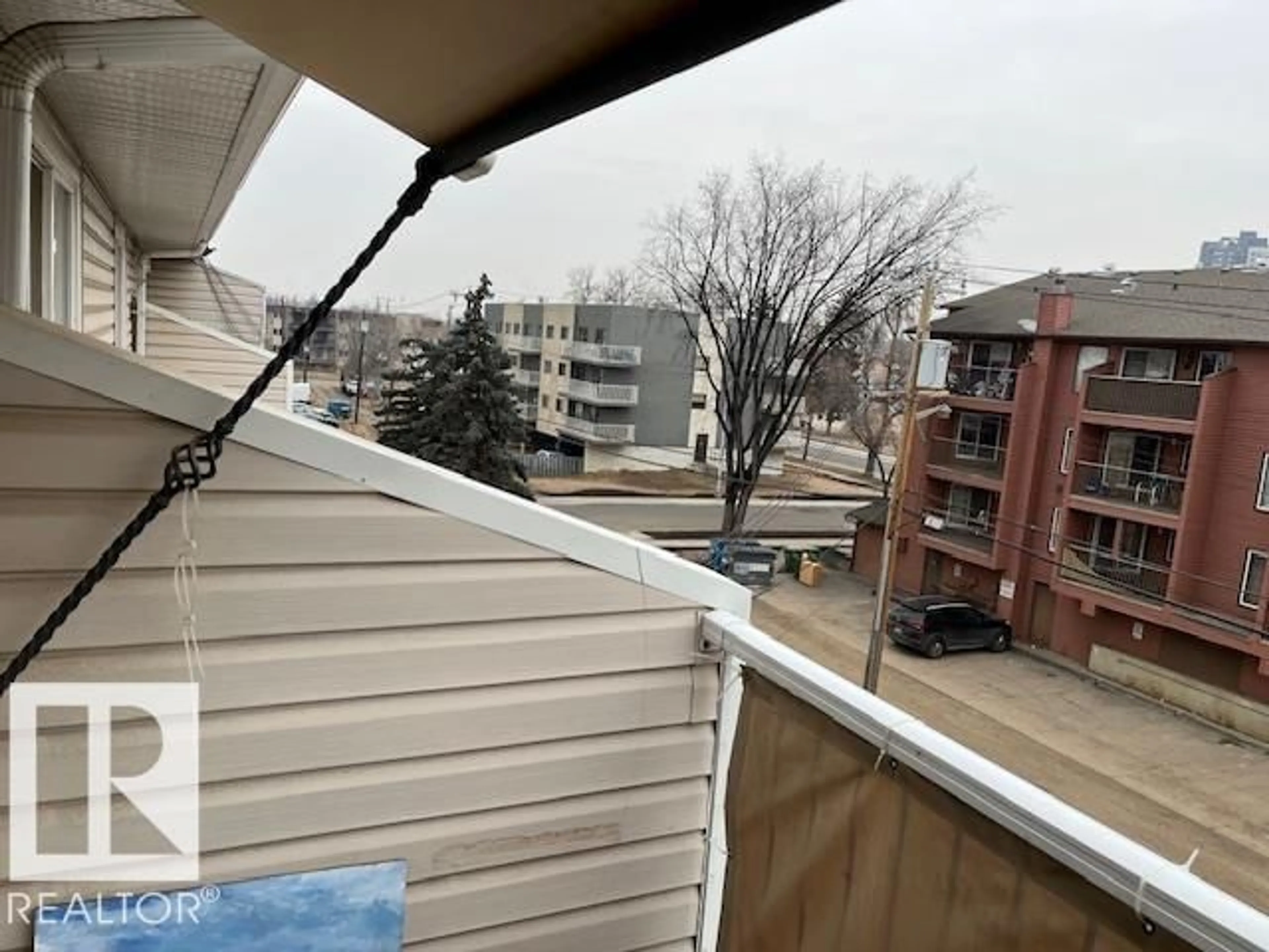 Balcony in the apartment, city buildings view from balcony for #407 - 10529 93 ST, Edmonton Alberta T5H1X6