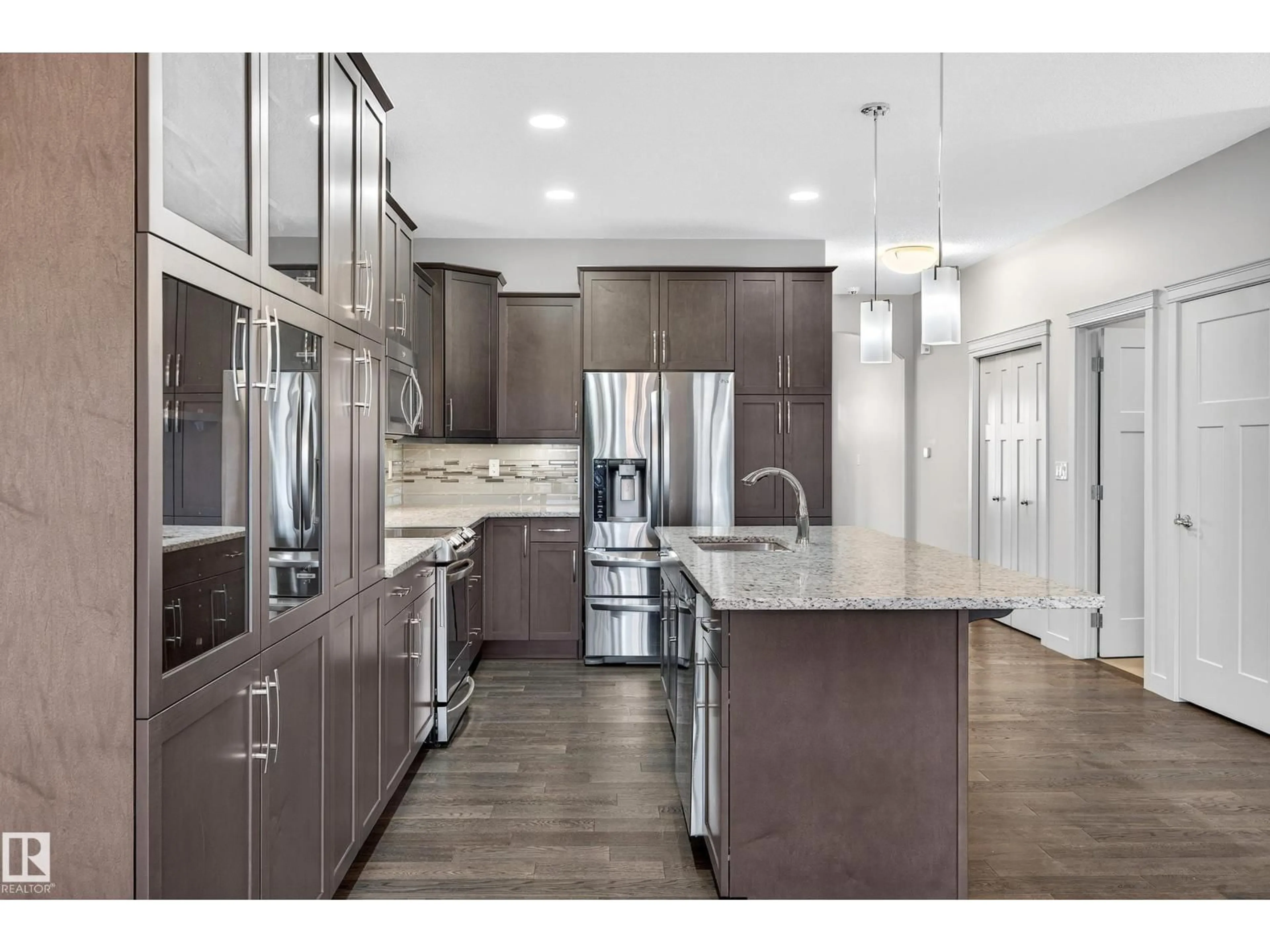 Open concept kitchen, unknown for #13 - 8132 217 ST NW, Edmonton Alberta T5T4S1