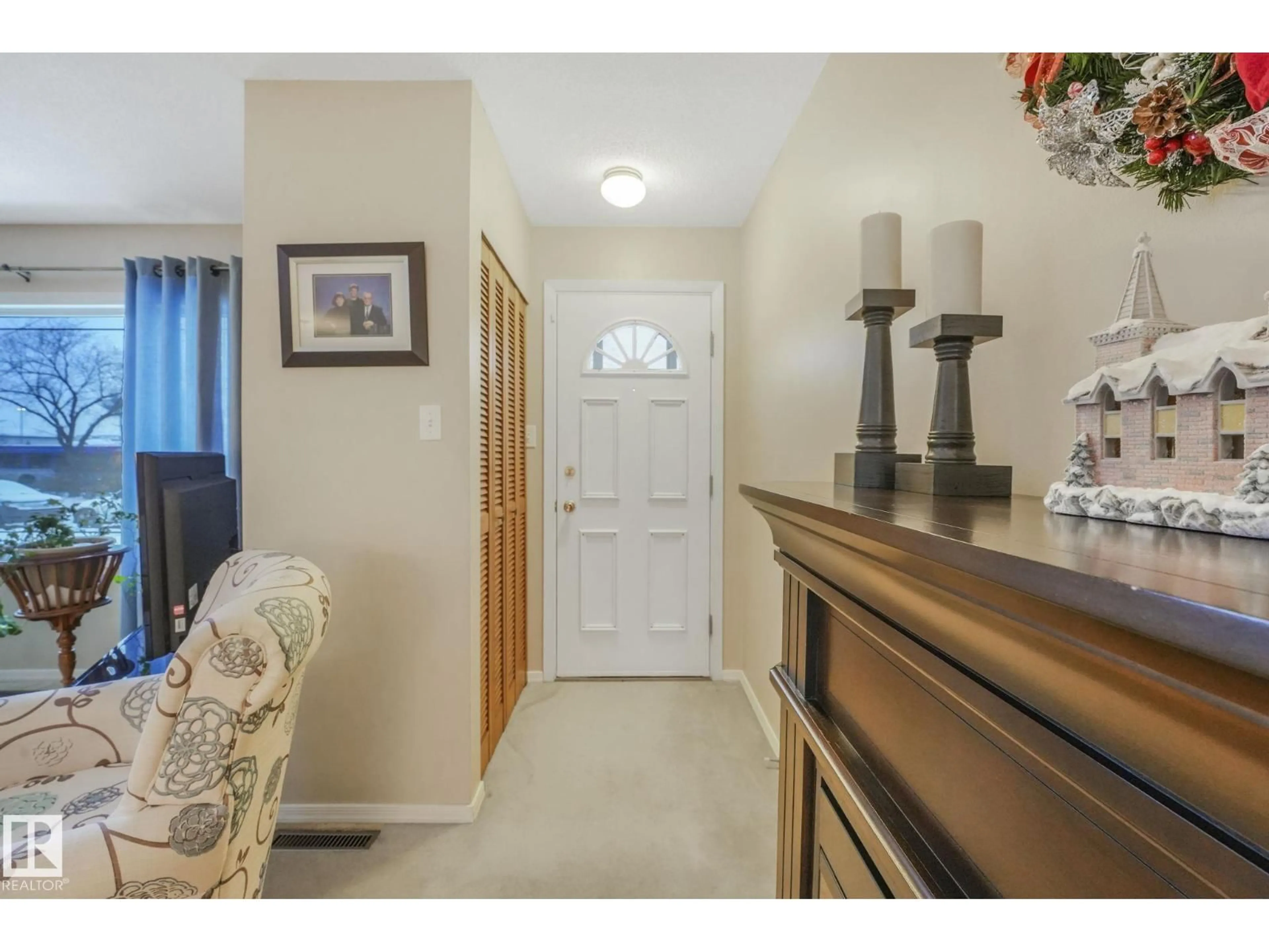 Indoor entryway for 12503 137 AV, Edmonton Alberta T5L4C2