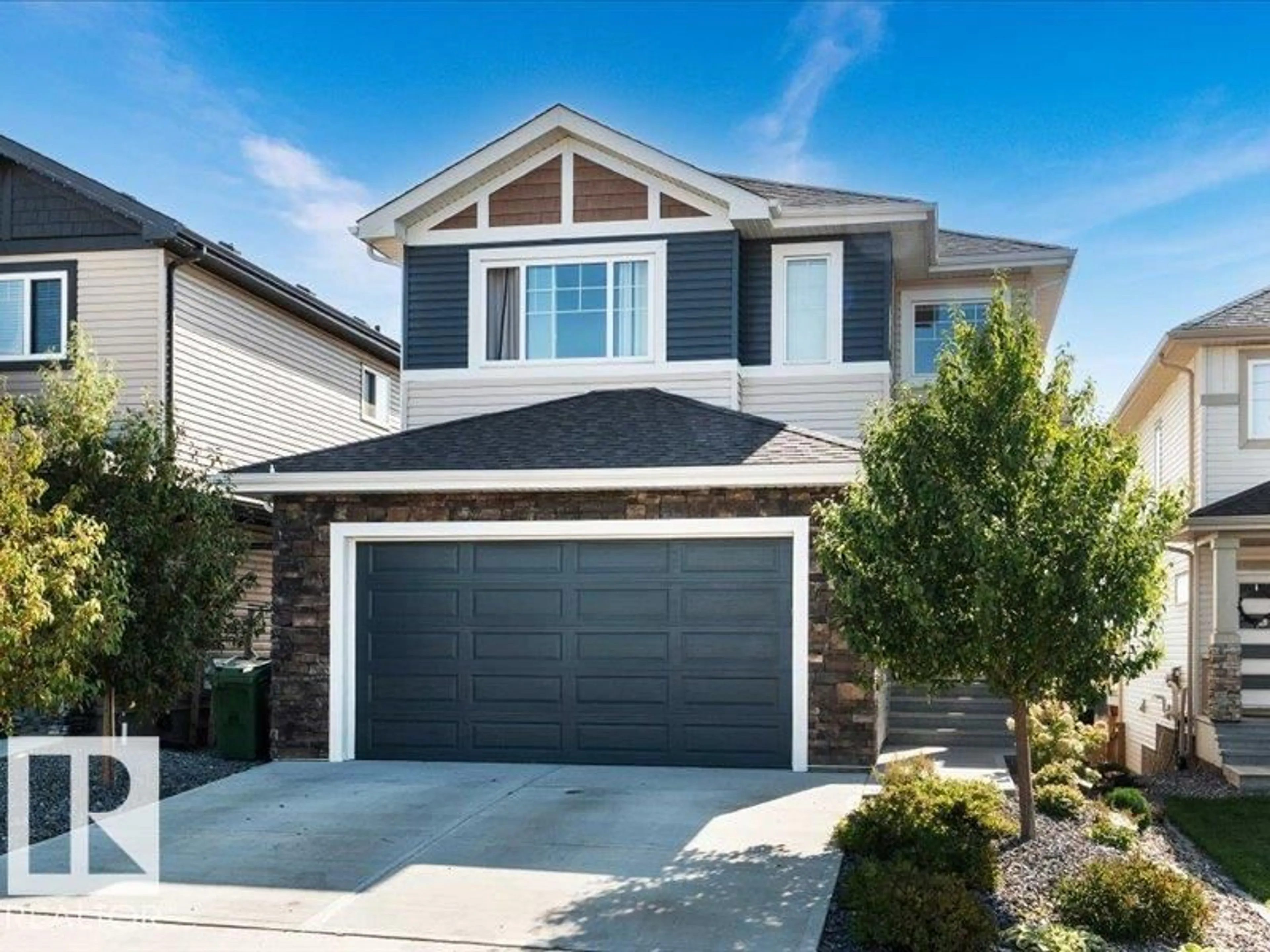 Home with vinyl exterior material, street for 153 WESTBROOK WD, Fort Saskatchewan Alberta T8L0L7