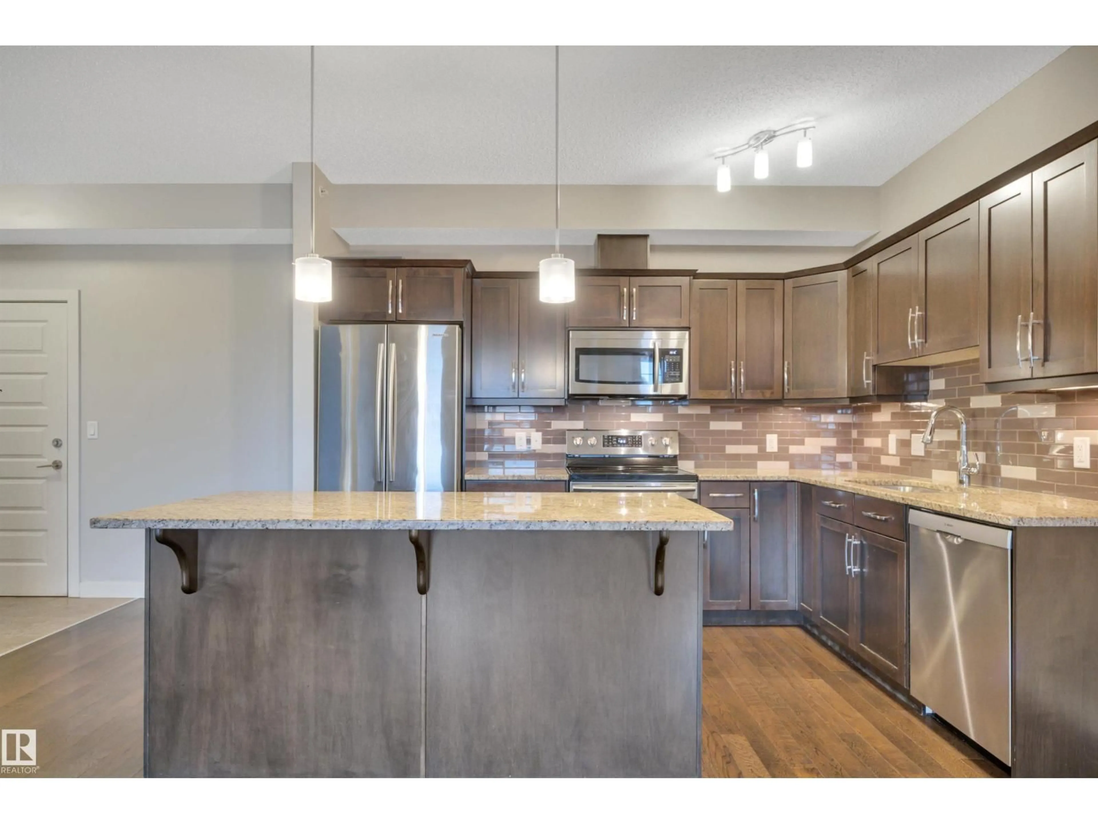 Open concept kitchen, unknown for 409 - 10520 56 AV, Edmonton Alberta T6H0X7