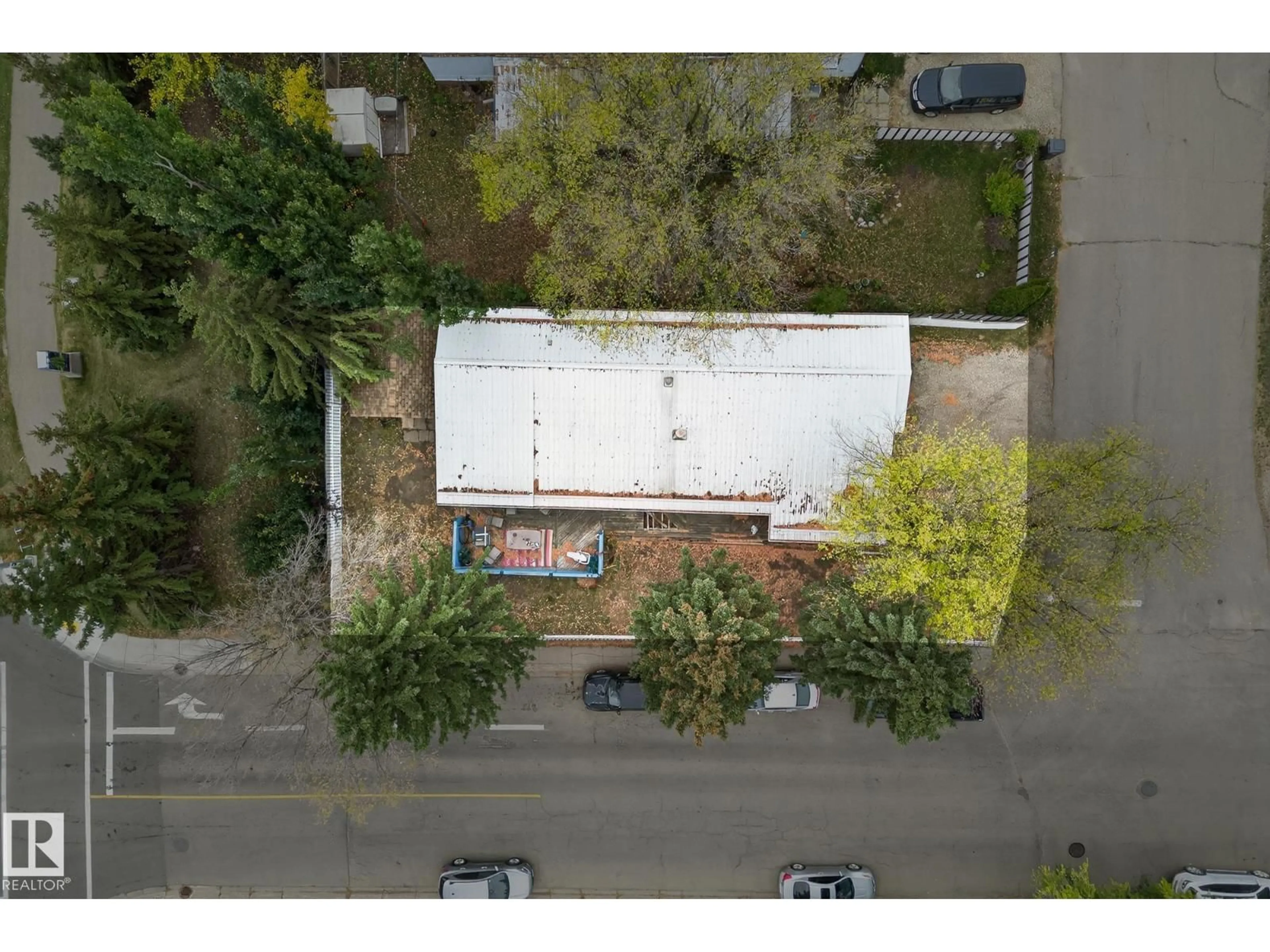 A pic from outside/outdoor area/front of a property/back of a property/a pic from drone, building for 18 305 CALAHOO ROAD, Spruce Grove Alberta T7X3K8