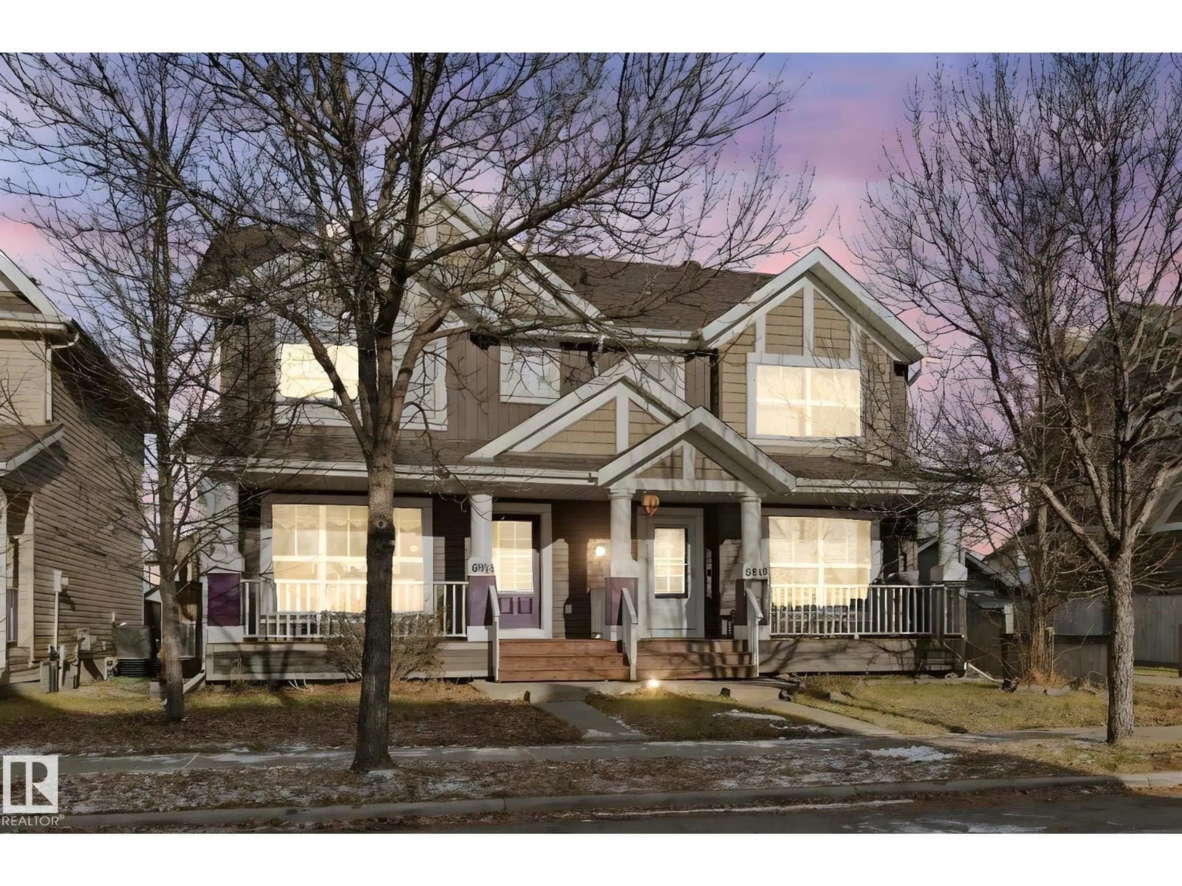 Home with brick exterior material, street for 6910 21A AV, Edmonton Alberta T6X0T6