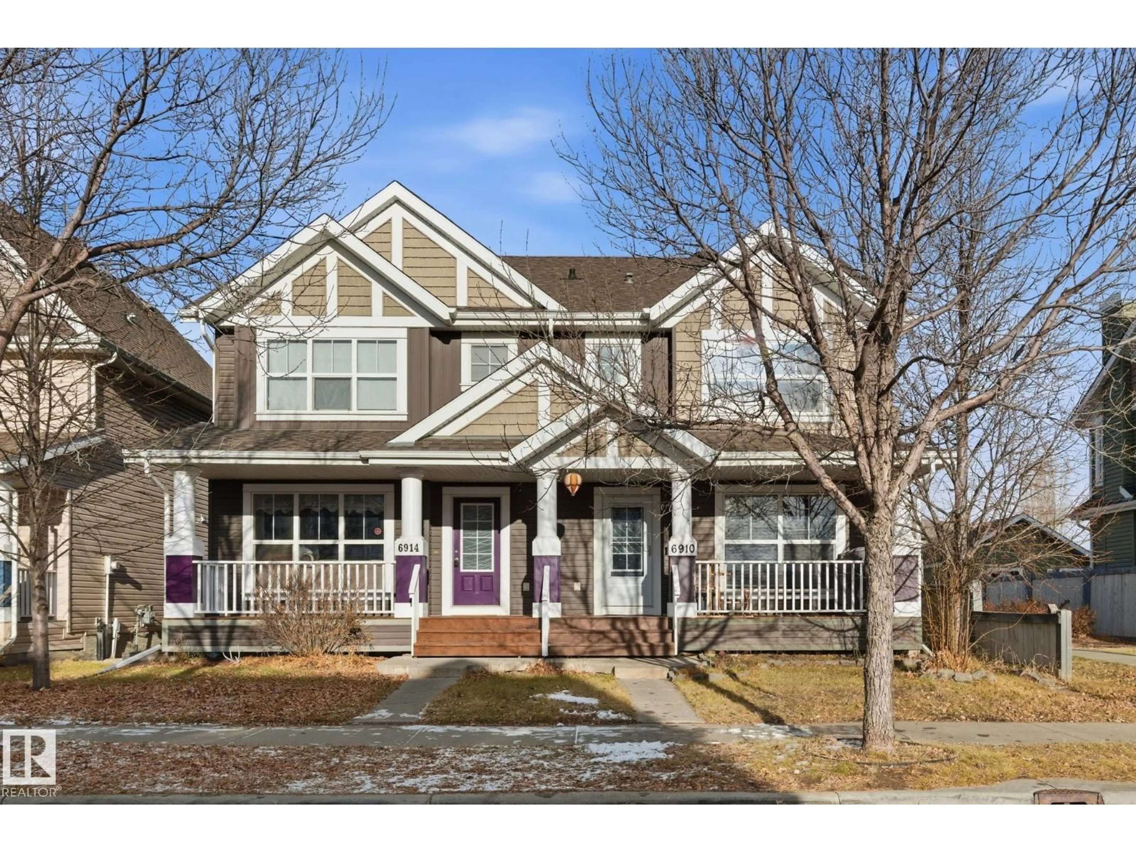 Home with vinyl exterior material, street for 6910 21A AV, Edmonton Alberta T6X0T6