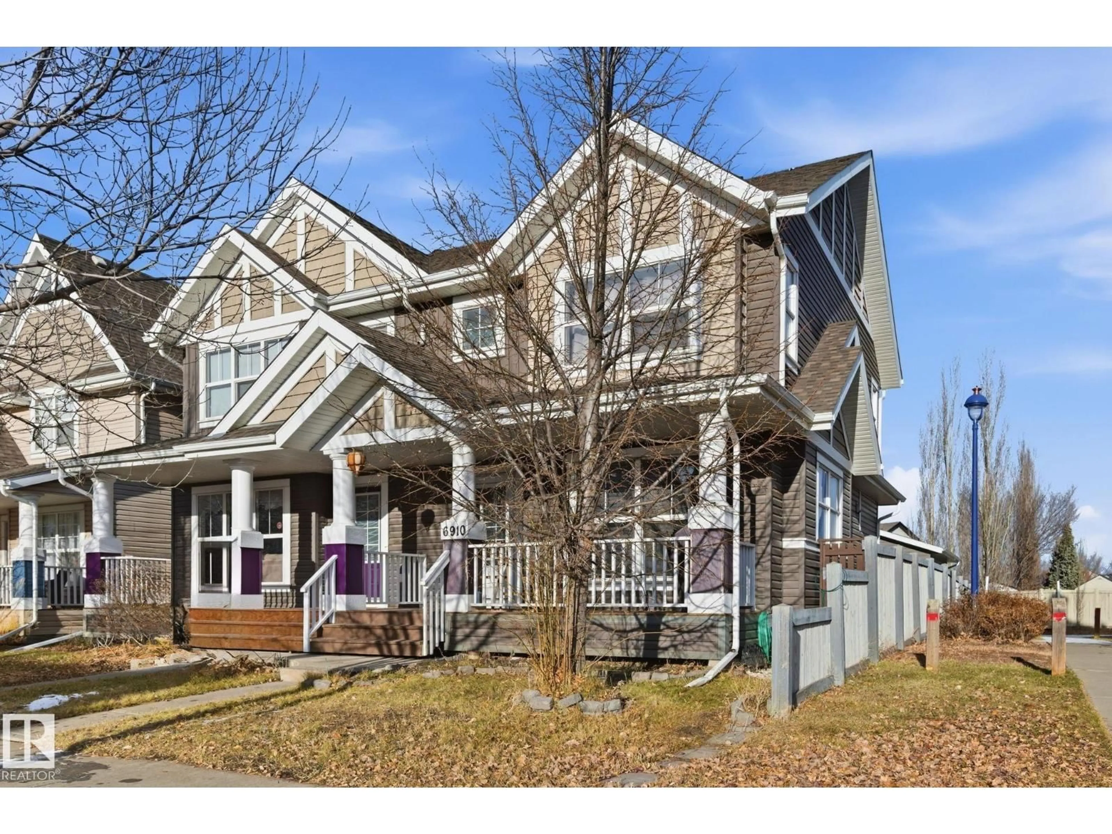 Home with vinyl exterior material, street for 6910 21A AV, Edmonton Alberta T6X0T6