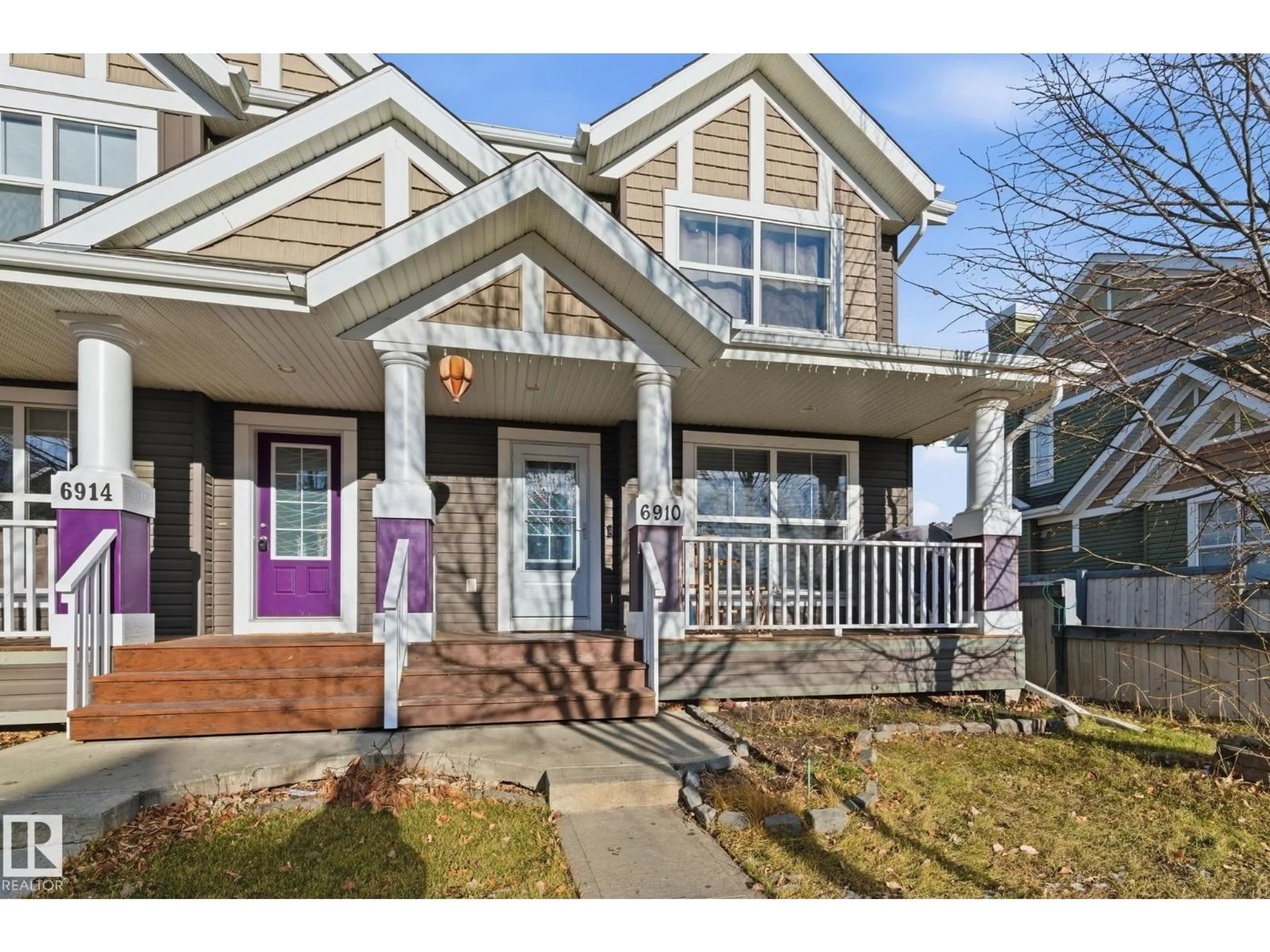 Home with vinyl exterior material, street for 6910 21A AV, Edmonton Alberta T6X0T6