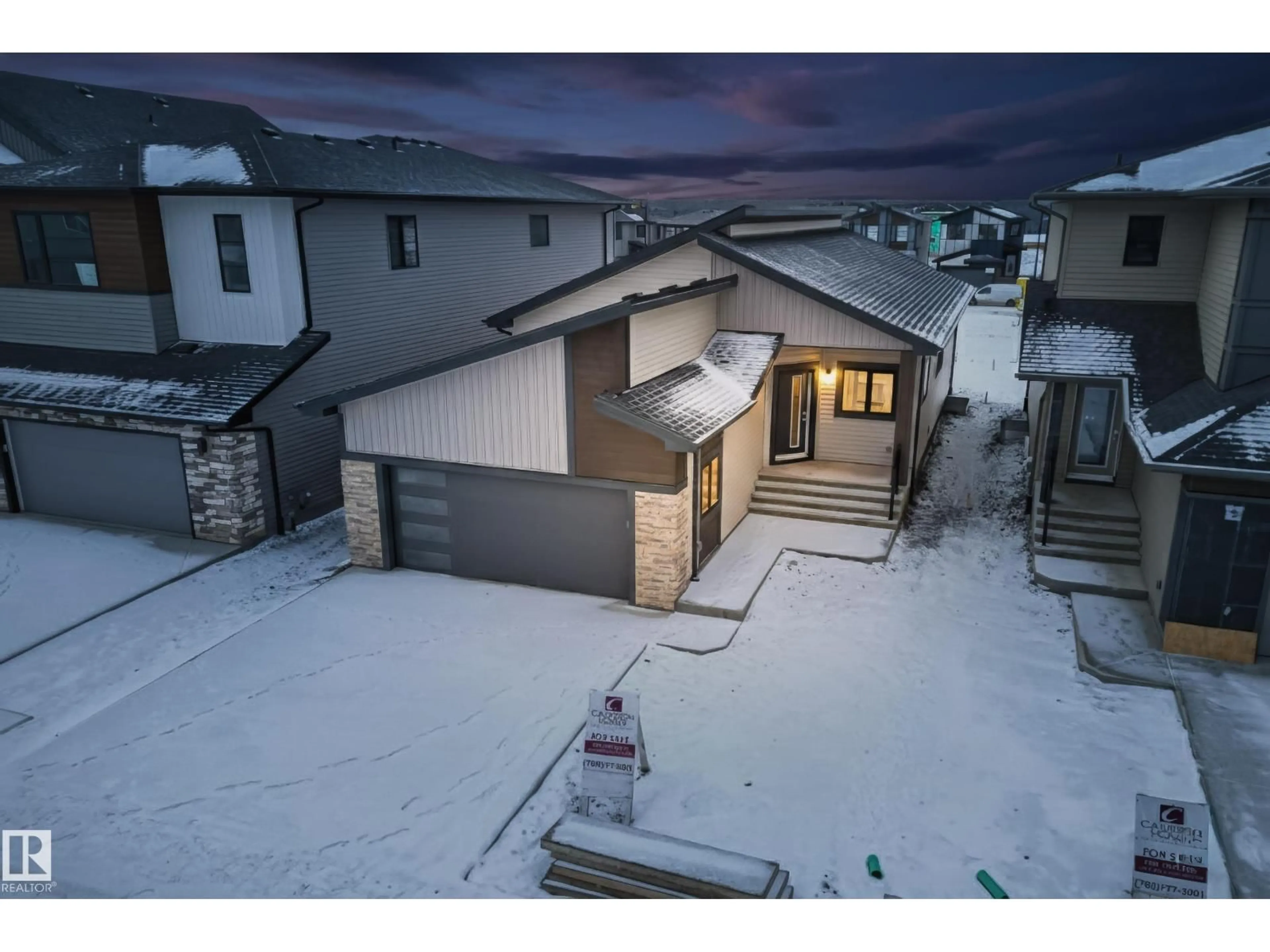 A pic from outside/outdoor area/front of a property/back of a property/a pic from drone, street for 7093 KIVIAQ CR, Edmonton Alberta T6W5N7