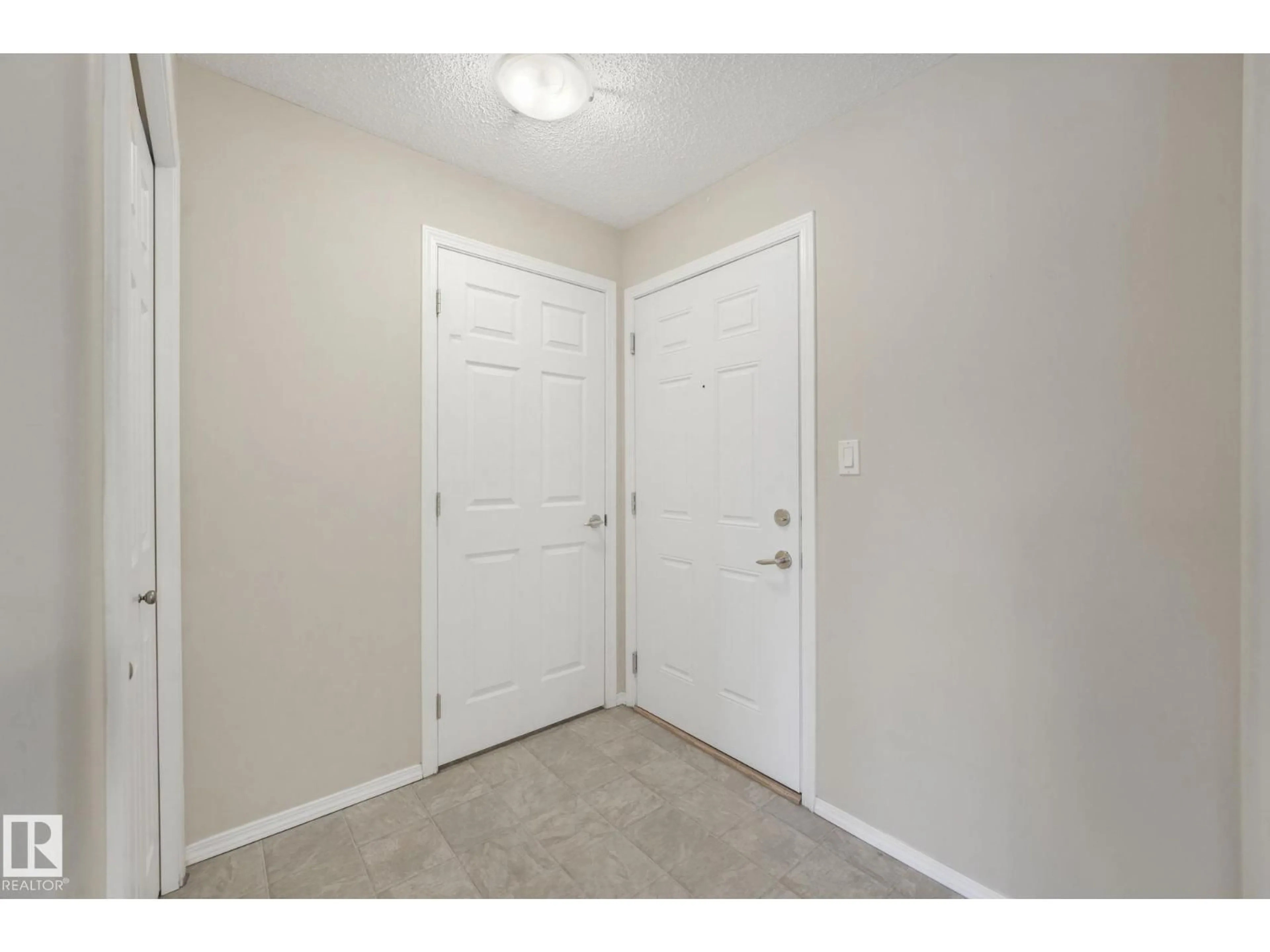 Indoor entryway for 216 - 13625 34 ST, Edmonton Alberta T5A0E3