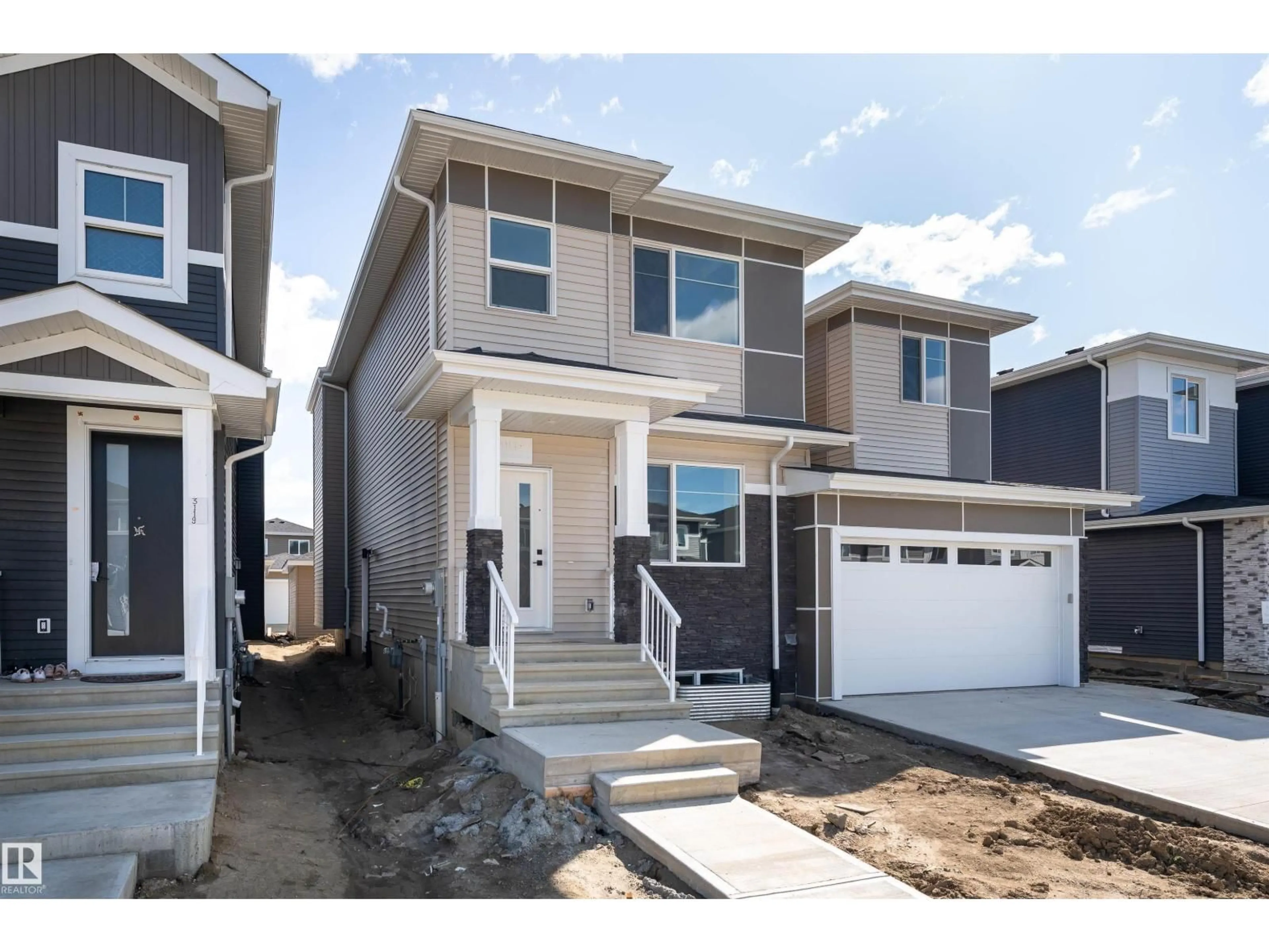 Home with vinyl exterior material, street for 3117 MAGPIE WY, Edmonton Alberta T5S0V3