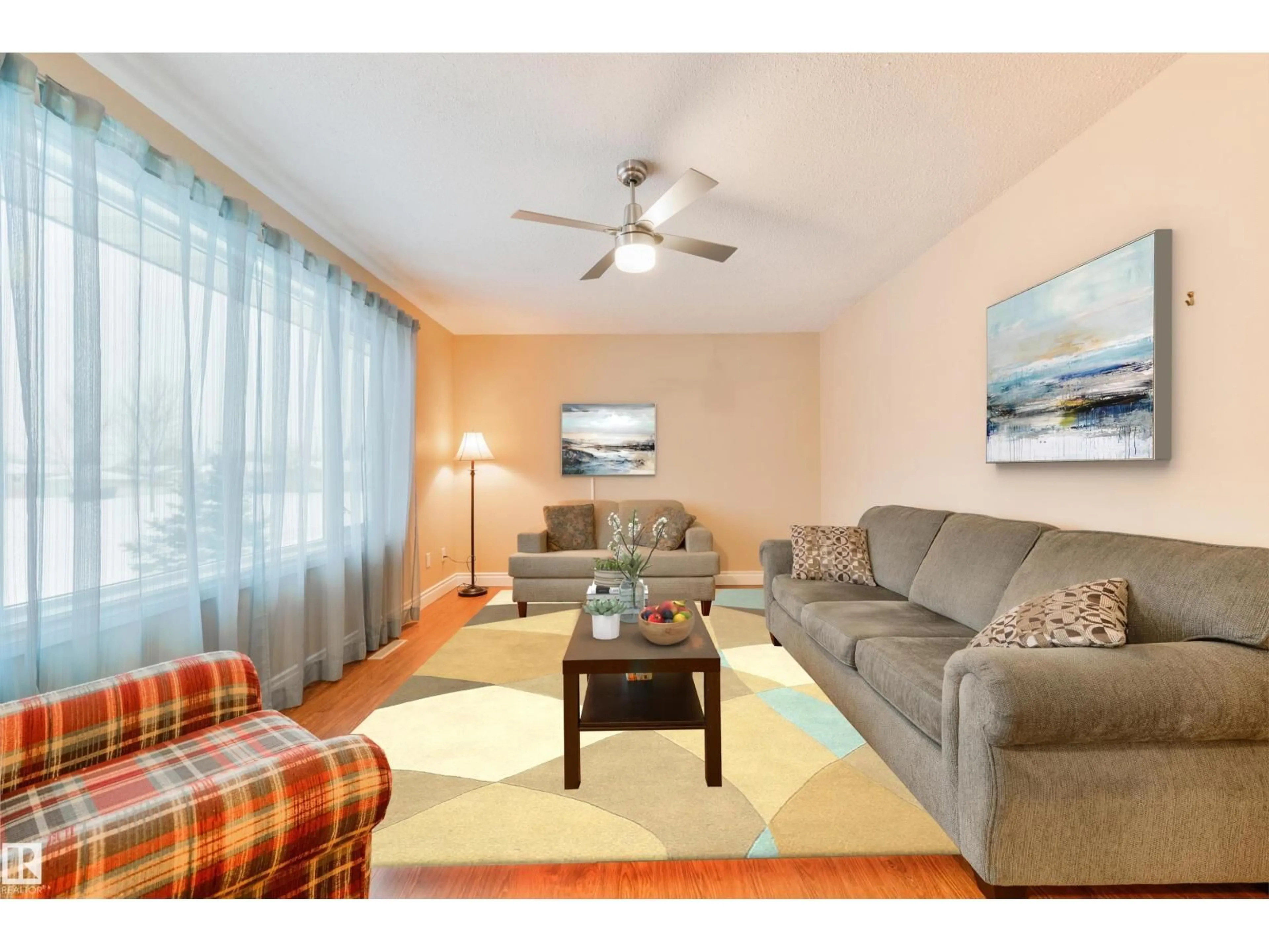 Living room with furniture, wood/laminate floor for 13420 60 ST, Edmonton Alberta T5A0S6