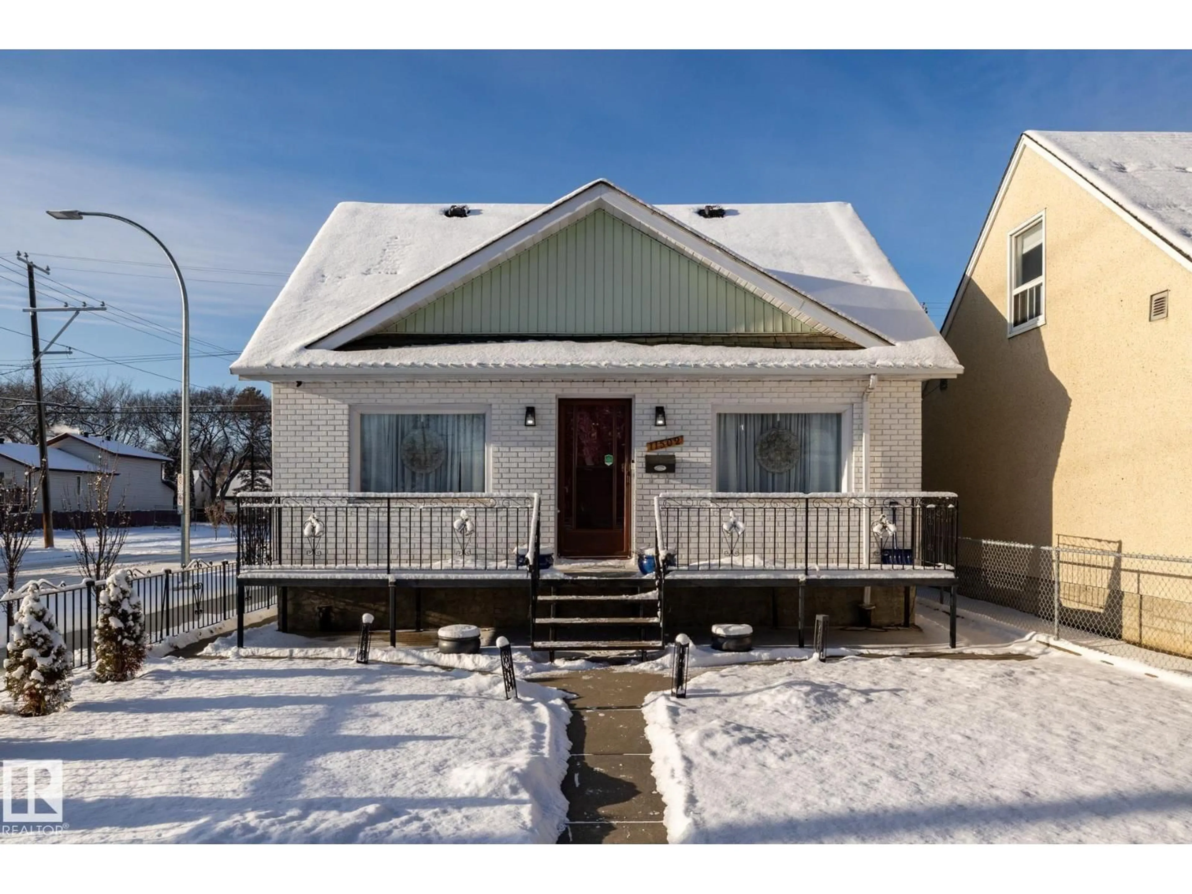 Home with vinyl exterior material, street for 11502 89 ST, Edmonton Alberta T5B3T9