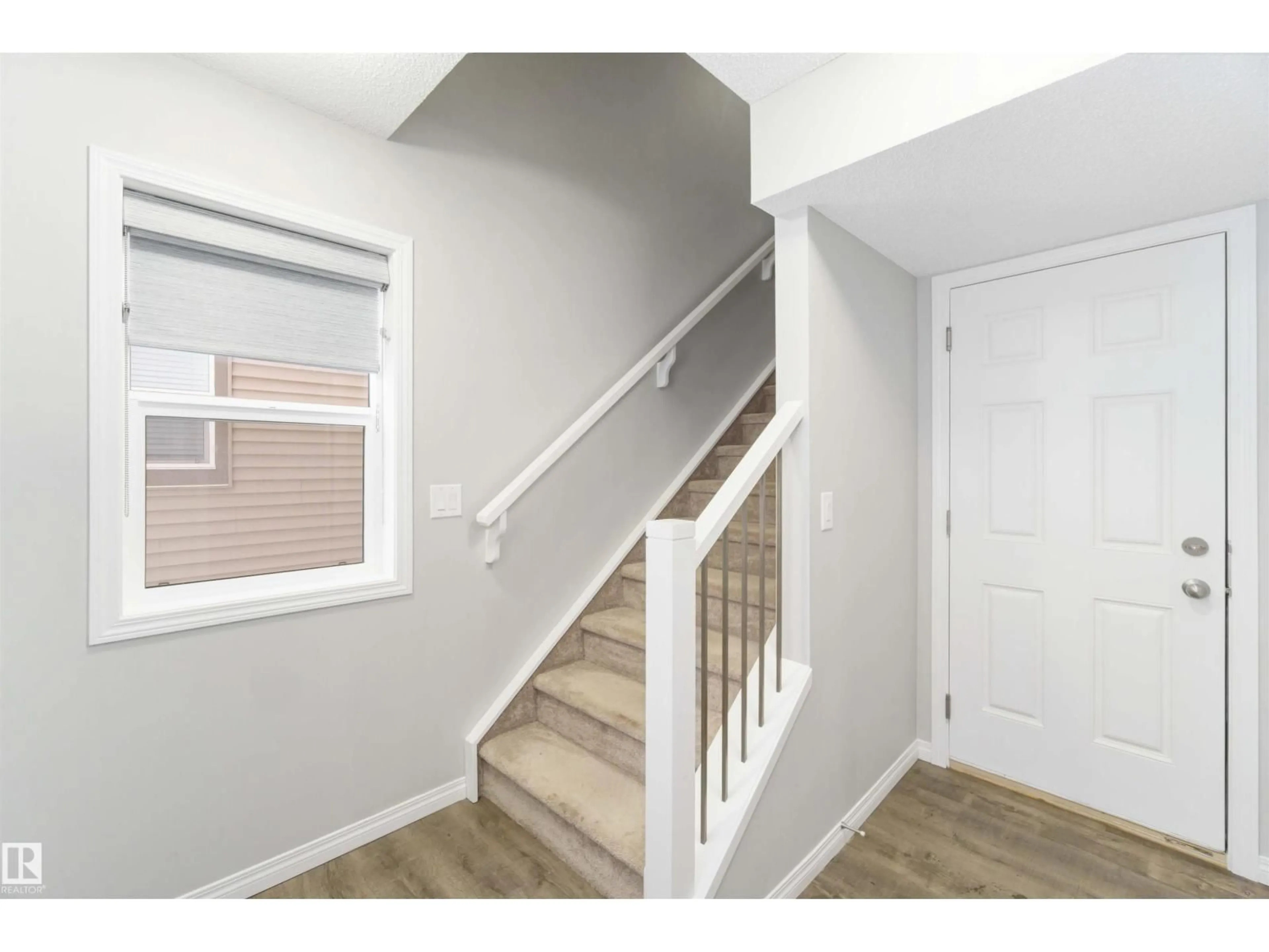 Indoor entryway for #54 - 2072 WONNACOTT WY, Edmonton Alberta T6X2V7