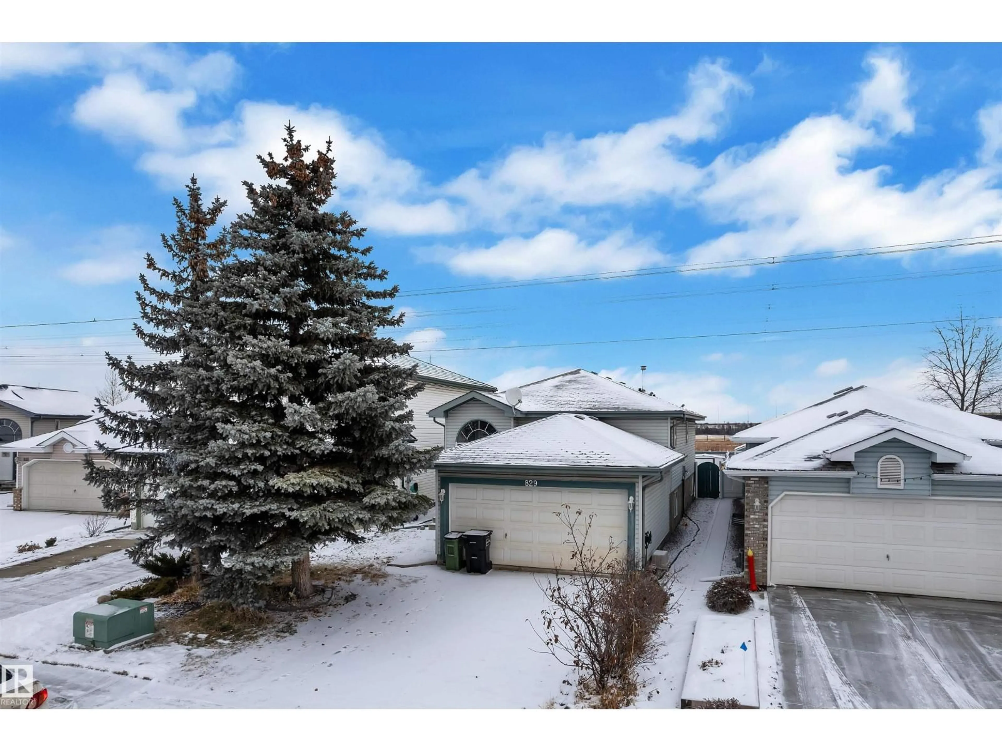 A pic from outside/outdoor area/front of a property/back of a property/a pic from drone, street for 829 BLACKLOCK WY, Edmonton Alberta T6W1C6