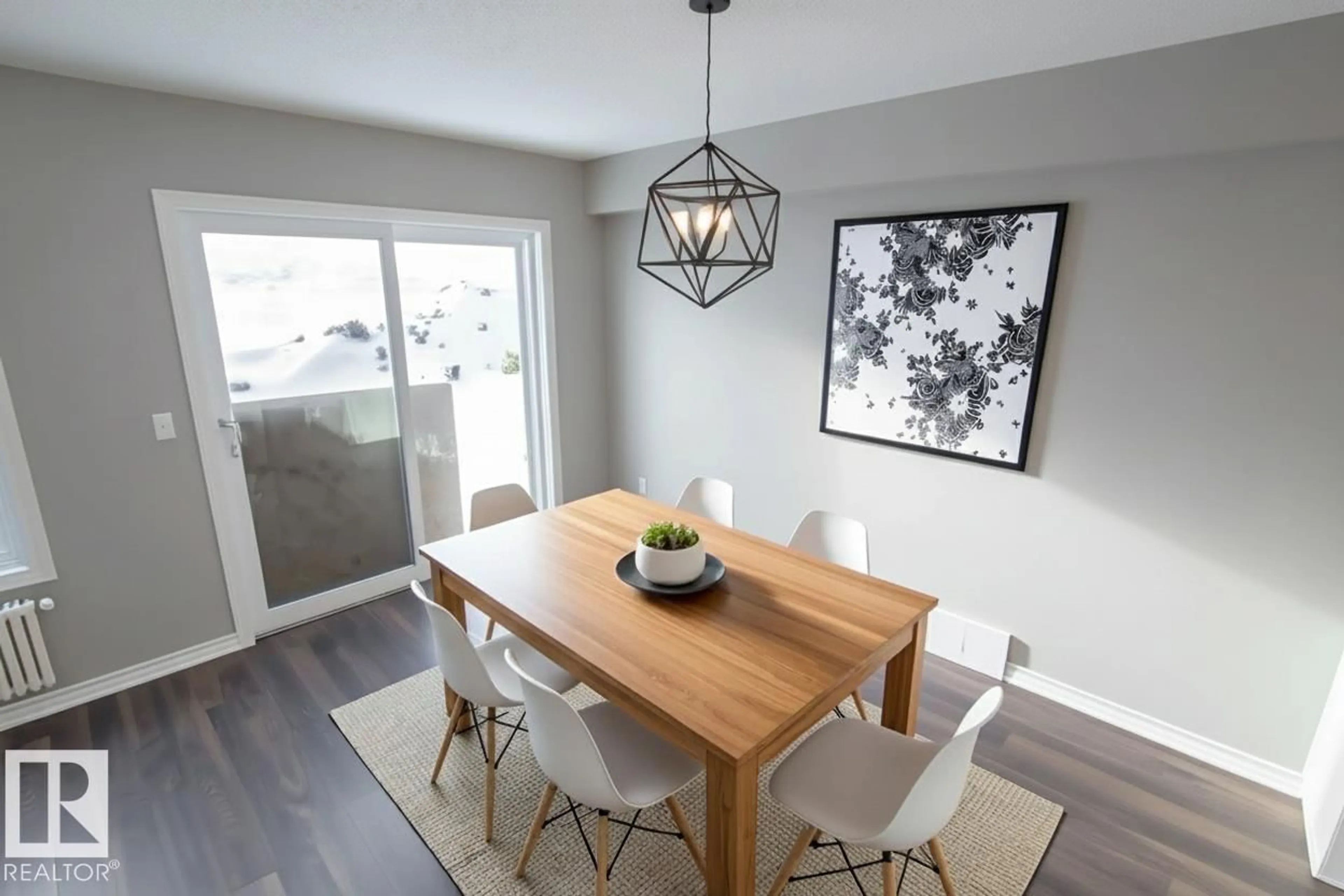 Dining room, wood/laminate floor for 344 172 AV, Edmonton Alberta T5Y4G8