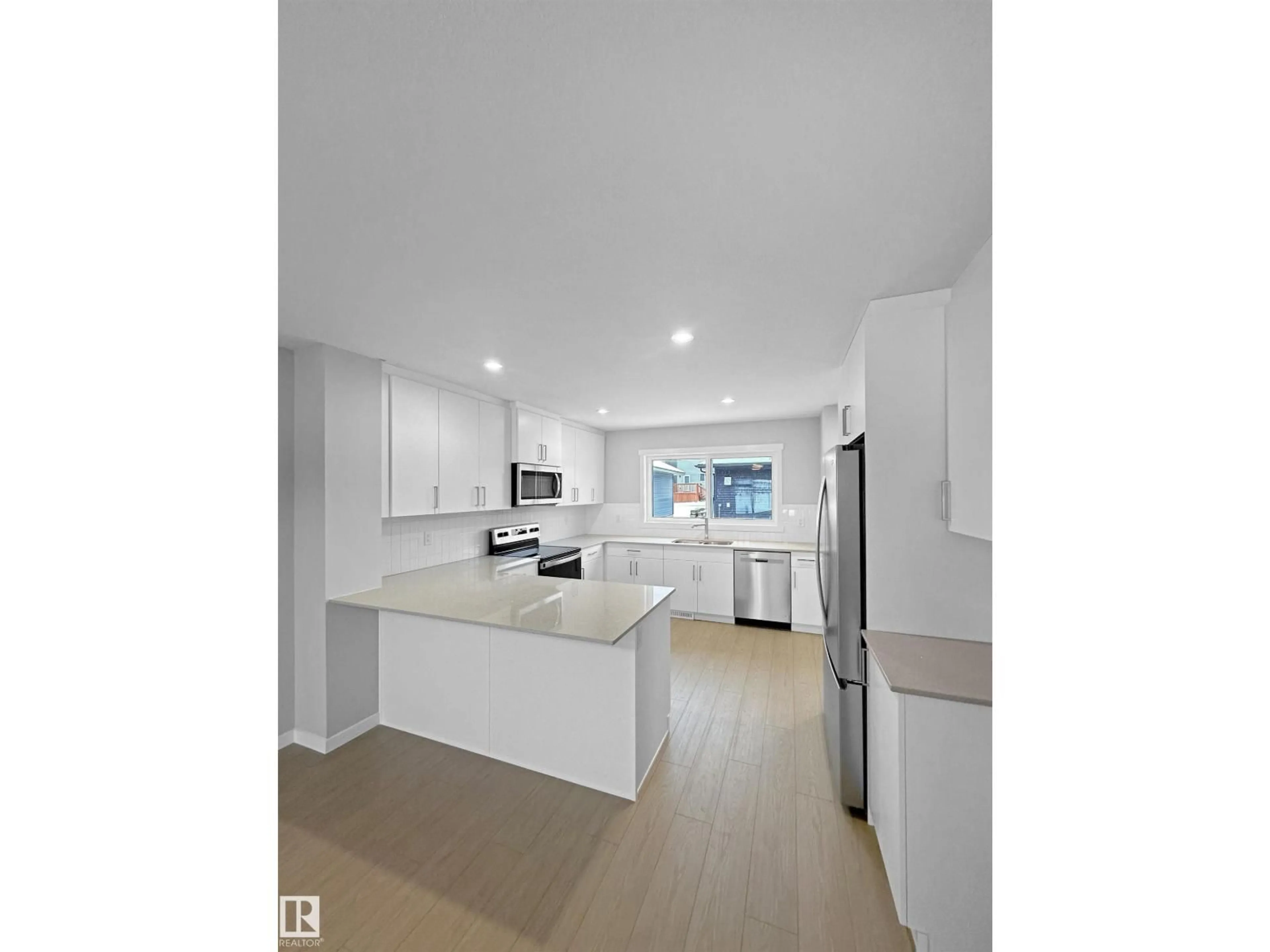 Open concept kitchen, unknown for 328 172 AV, Edmonton Alberta T5Y4G8