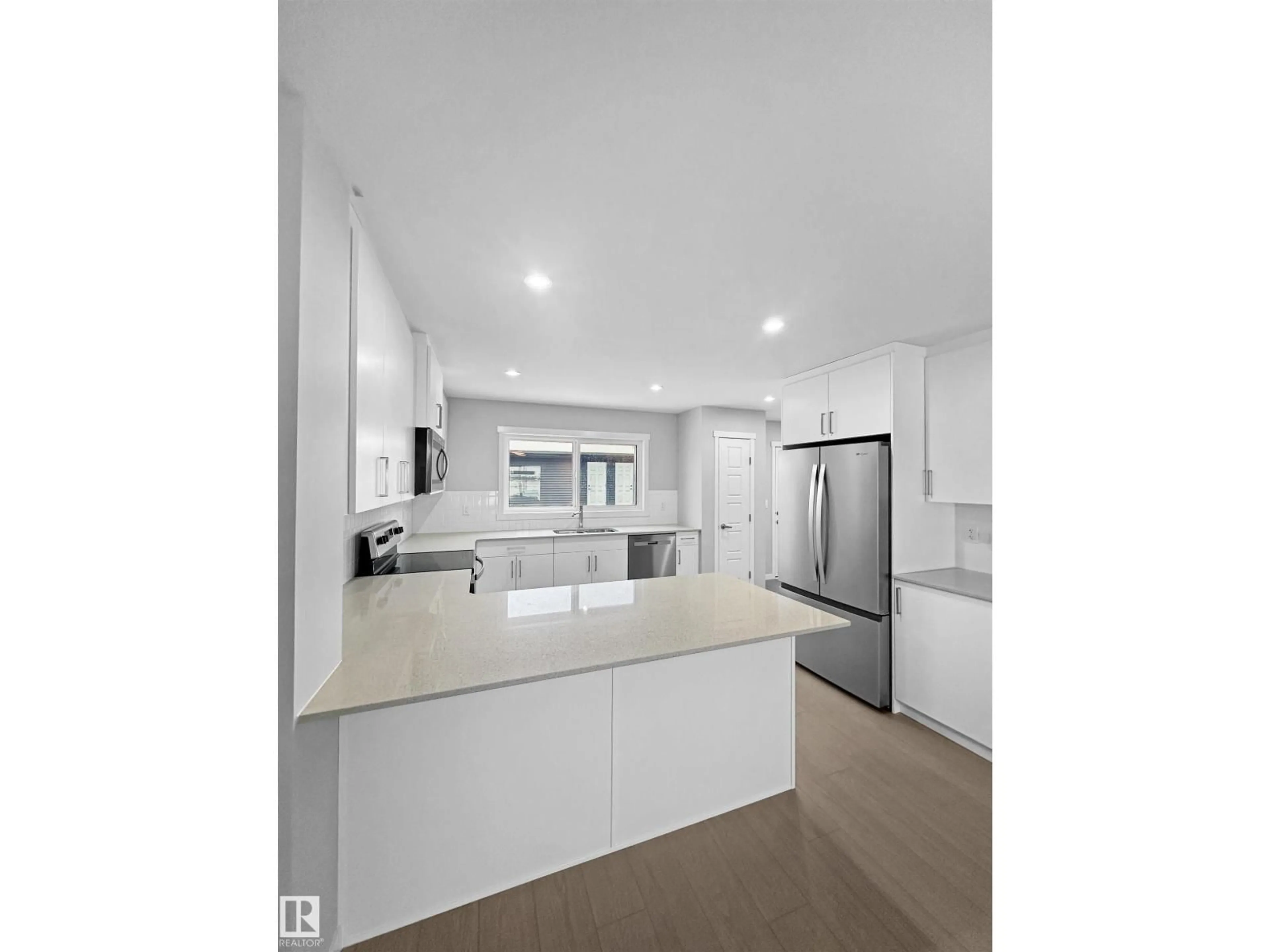 Open concept kitchen, unknown for NW - 17668 69A ST, Edmonton Alberta T5Z0W8