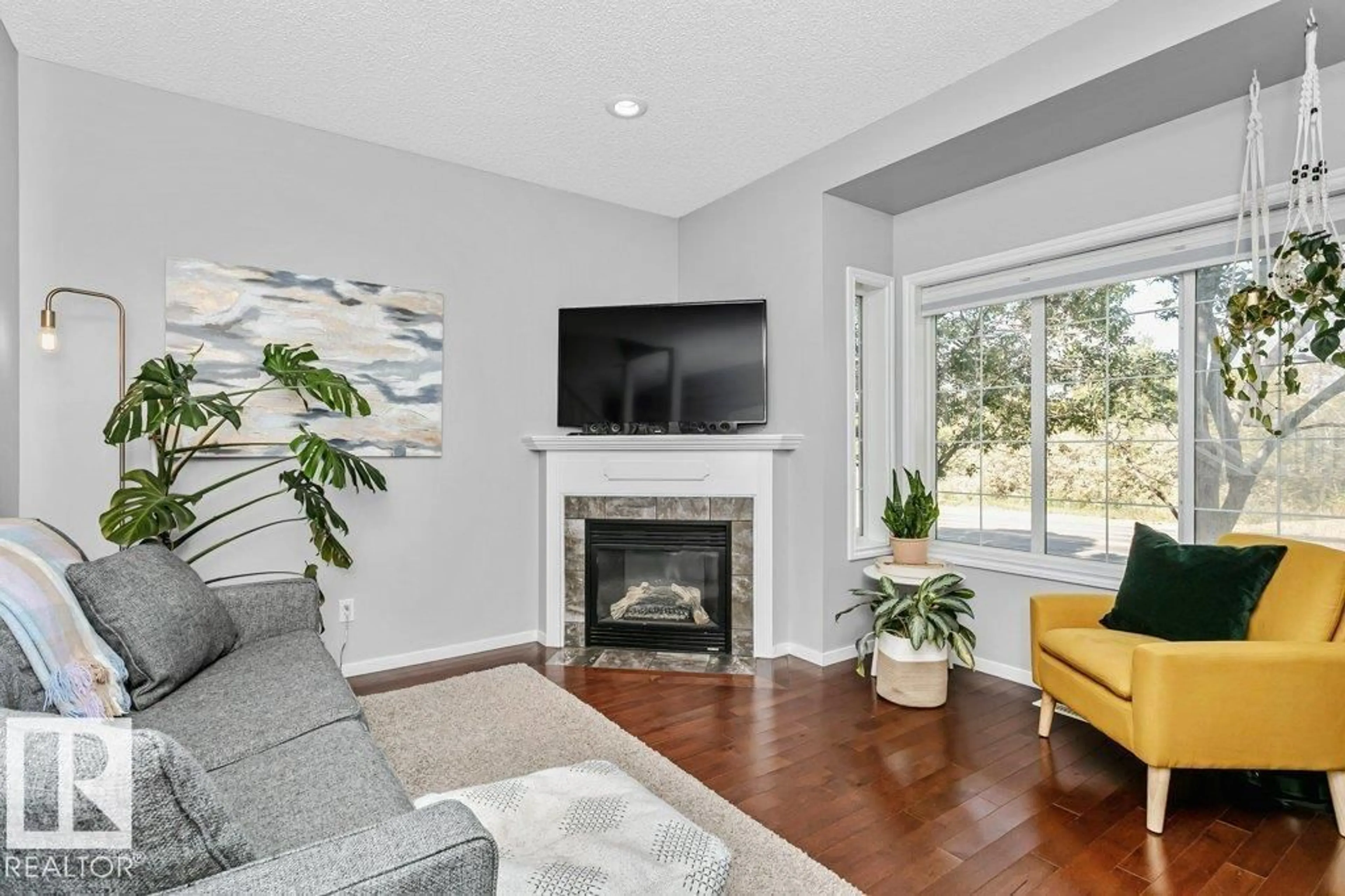 Living room with furniture, unknown for 9109 98 AV, Edmonton Alberta T6C4S5