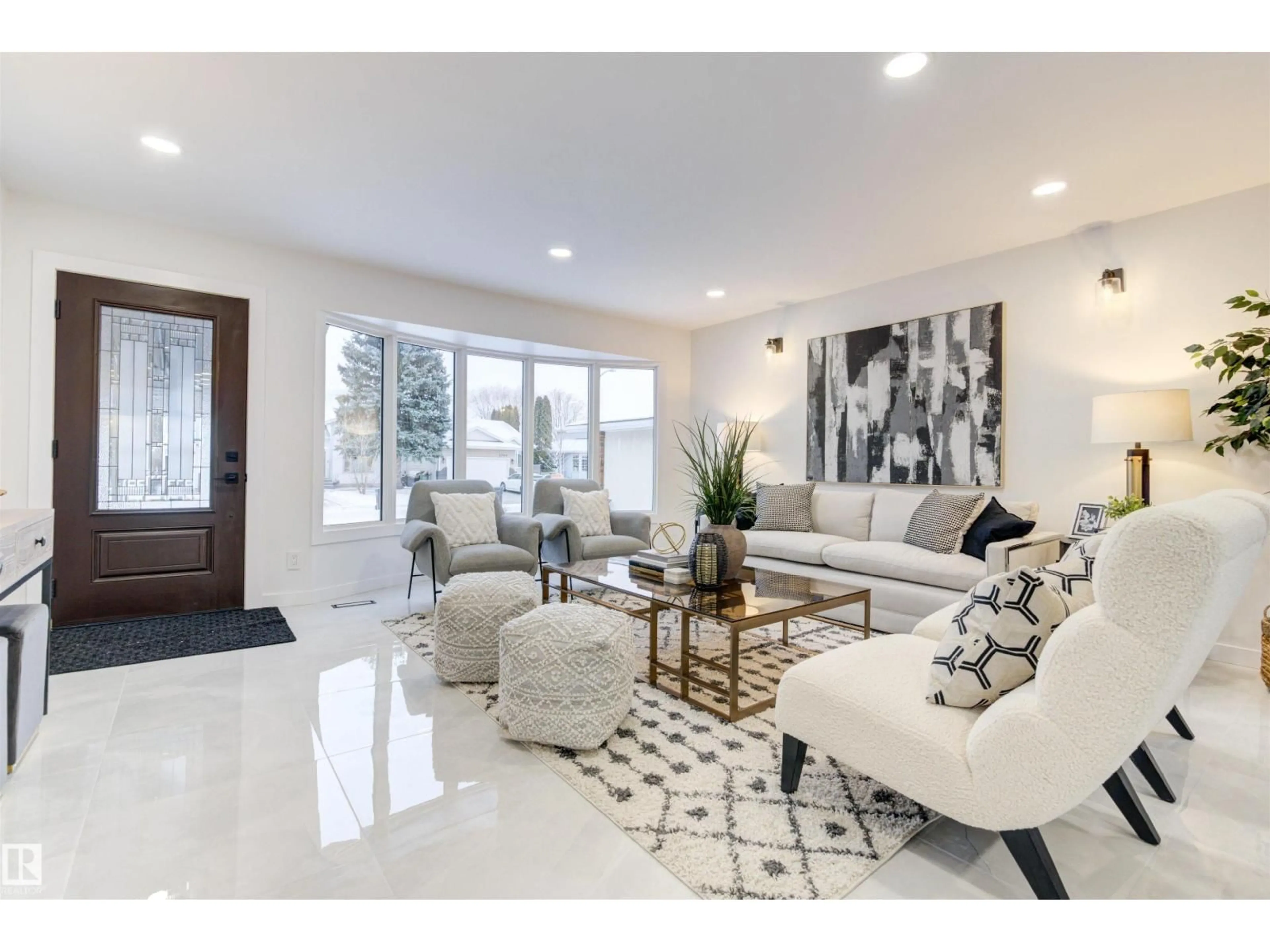 Living room with furniture, ceramic/tile floor for 2712 41 ST, Edmonton Alberta T6L4H1