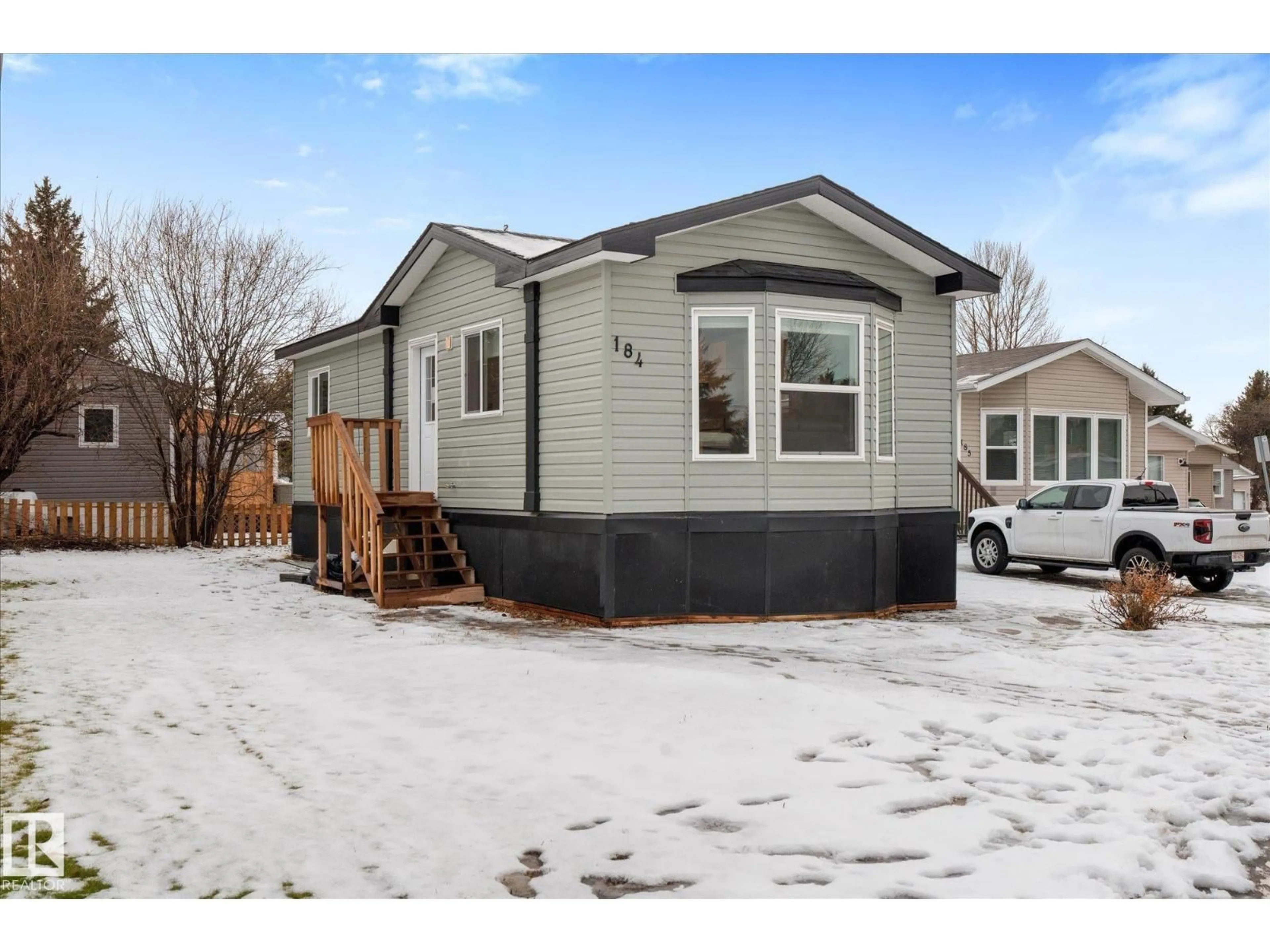 Home with vinyl exterior material, street for 305 - 184 CALAHOO ROAD, Spruce Grove Alberta T7X3L1