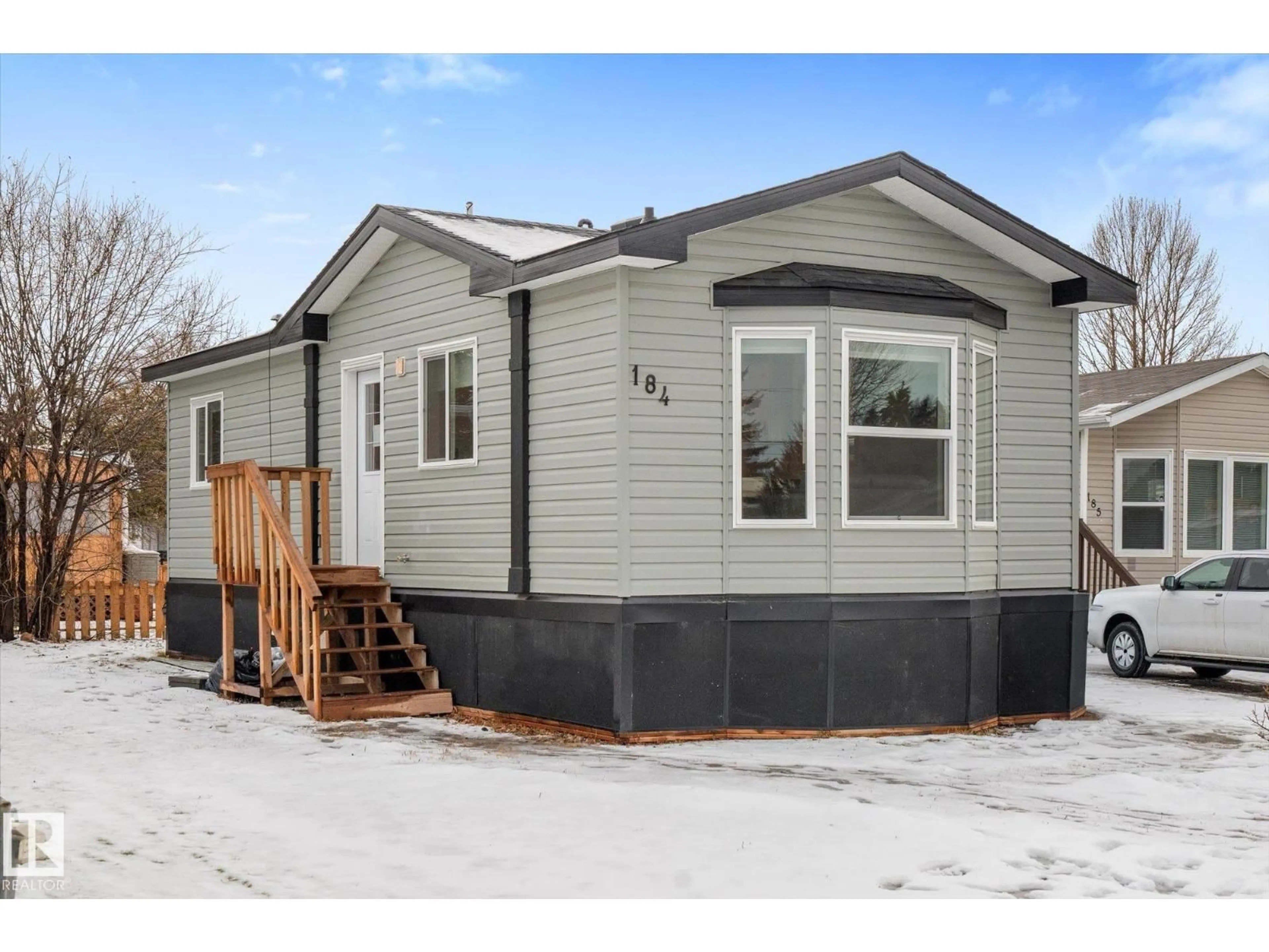 Home with vinyl exterior material, street for 305 - 184 CALAHOO ROAD, Spruce Grove Alberta T7X3L1