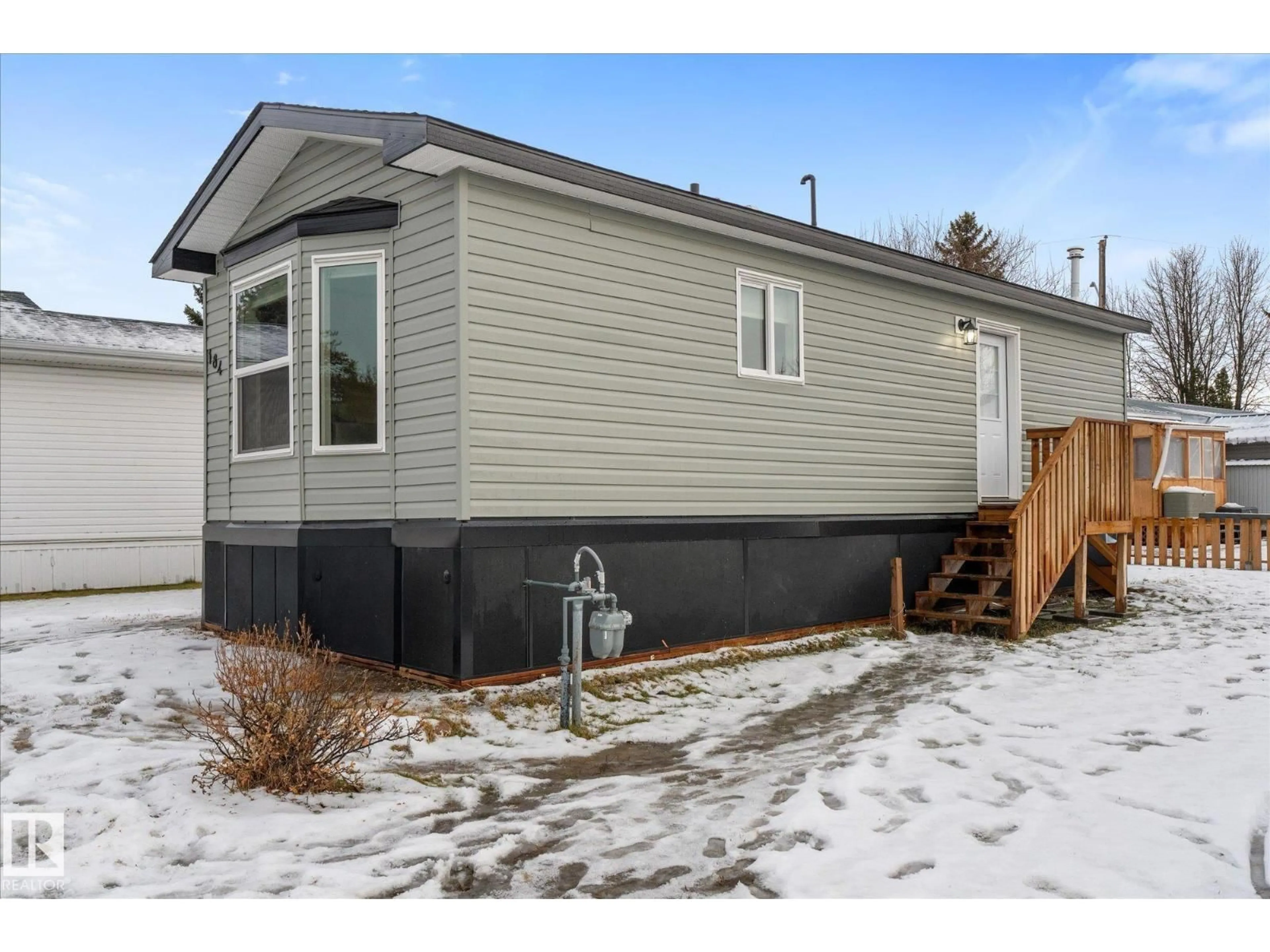 Home with vinyl exterior material, street for 305 - 184 CALAHOO ROAD, Spruce Grove Alberta T7X3L1