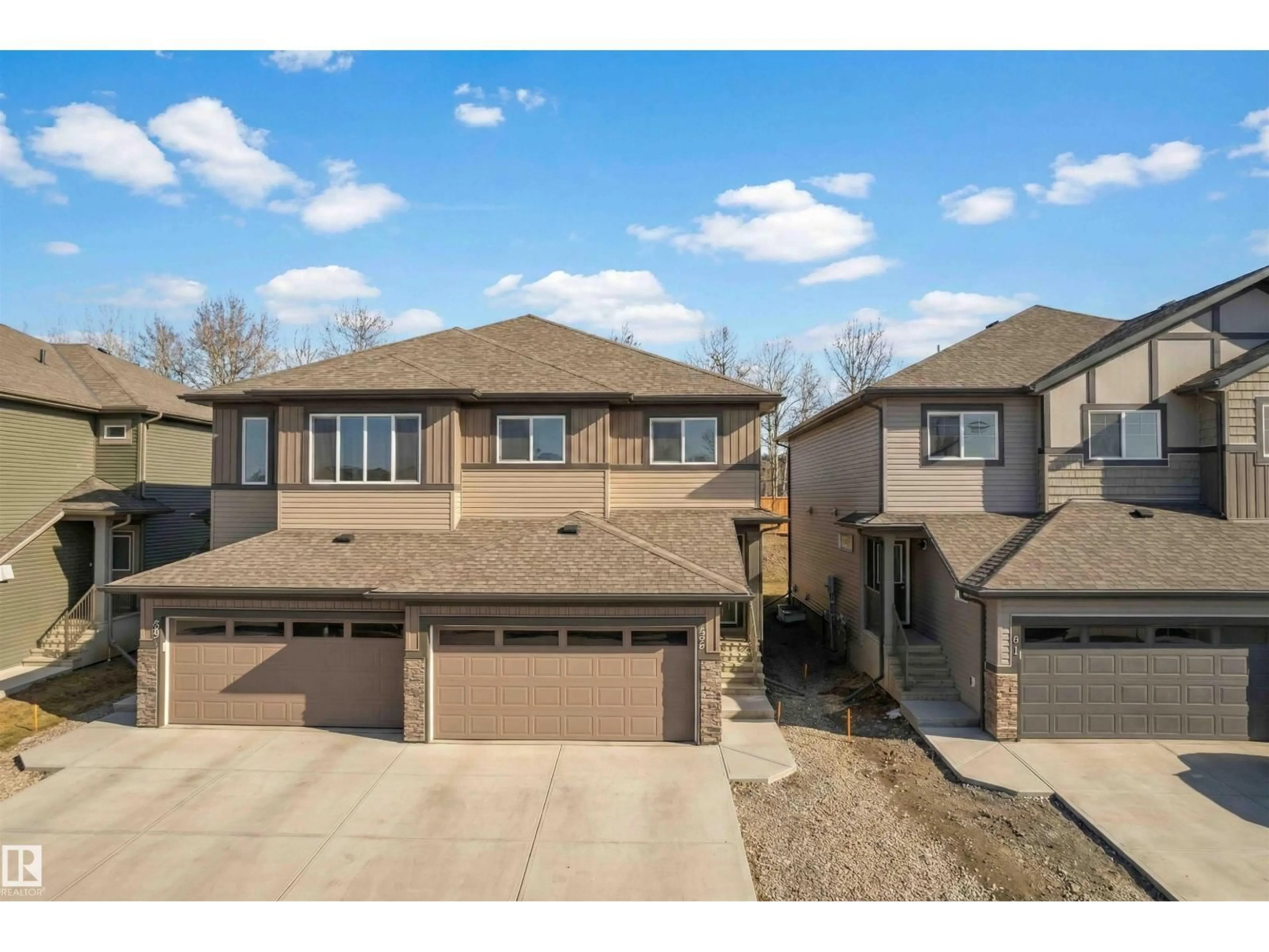 A pic from outside/outdoor area/front of a property/back of a property/a pic from drone, street for 93 ROSEWOOD WY, St. Albert Alberta T8N8B3