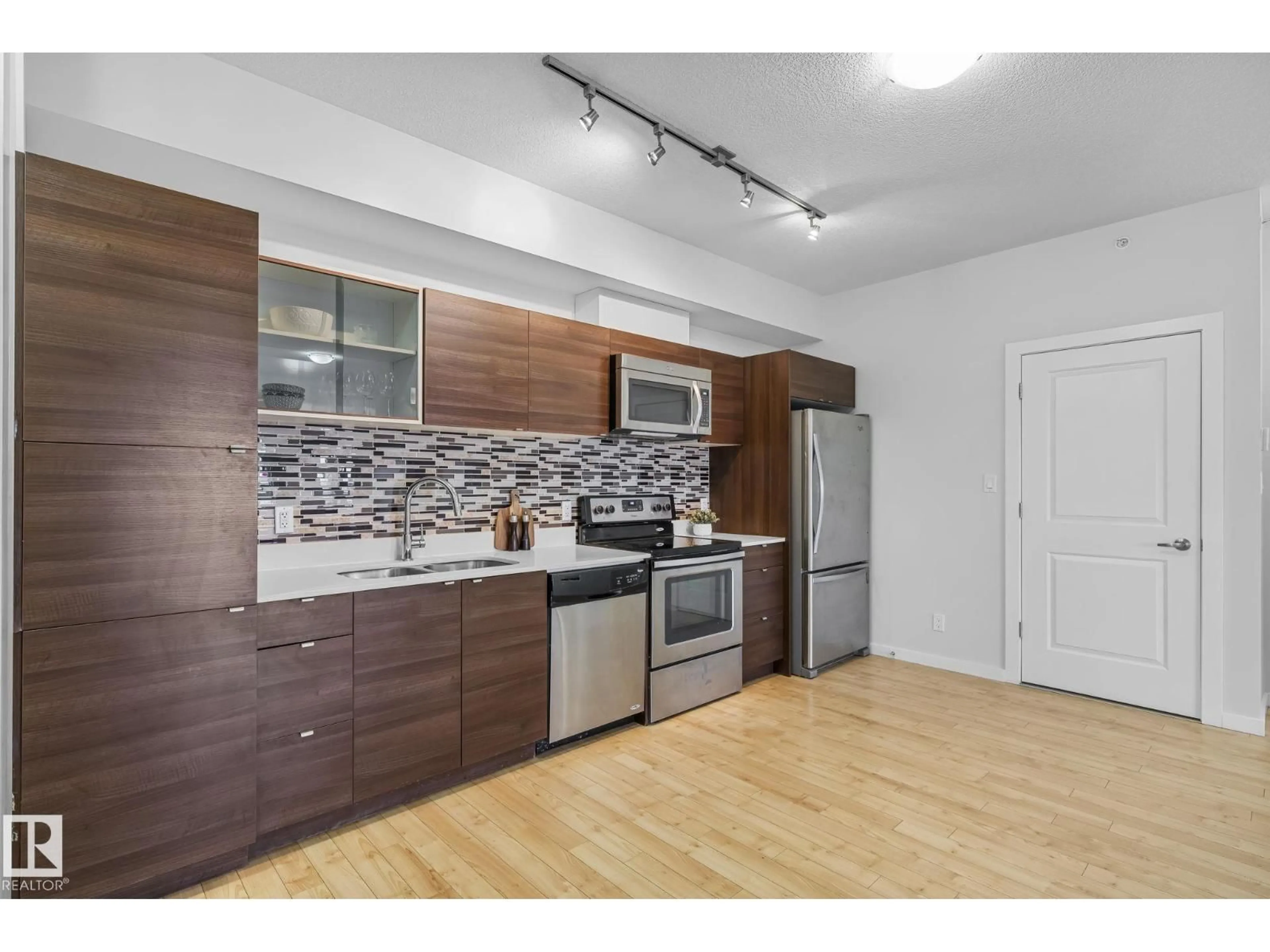 Standard kitchen, wood/laminate floor for #406 - 9523 160 AV, Edmonton Alberta T5Z0N1