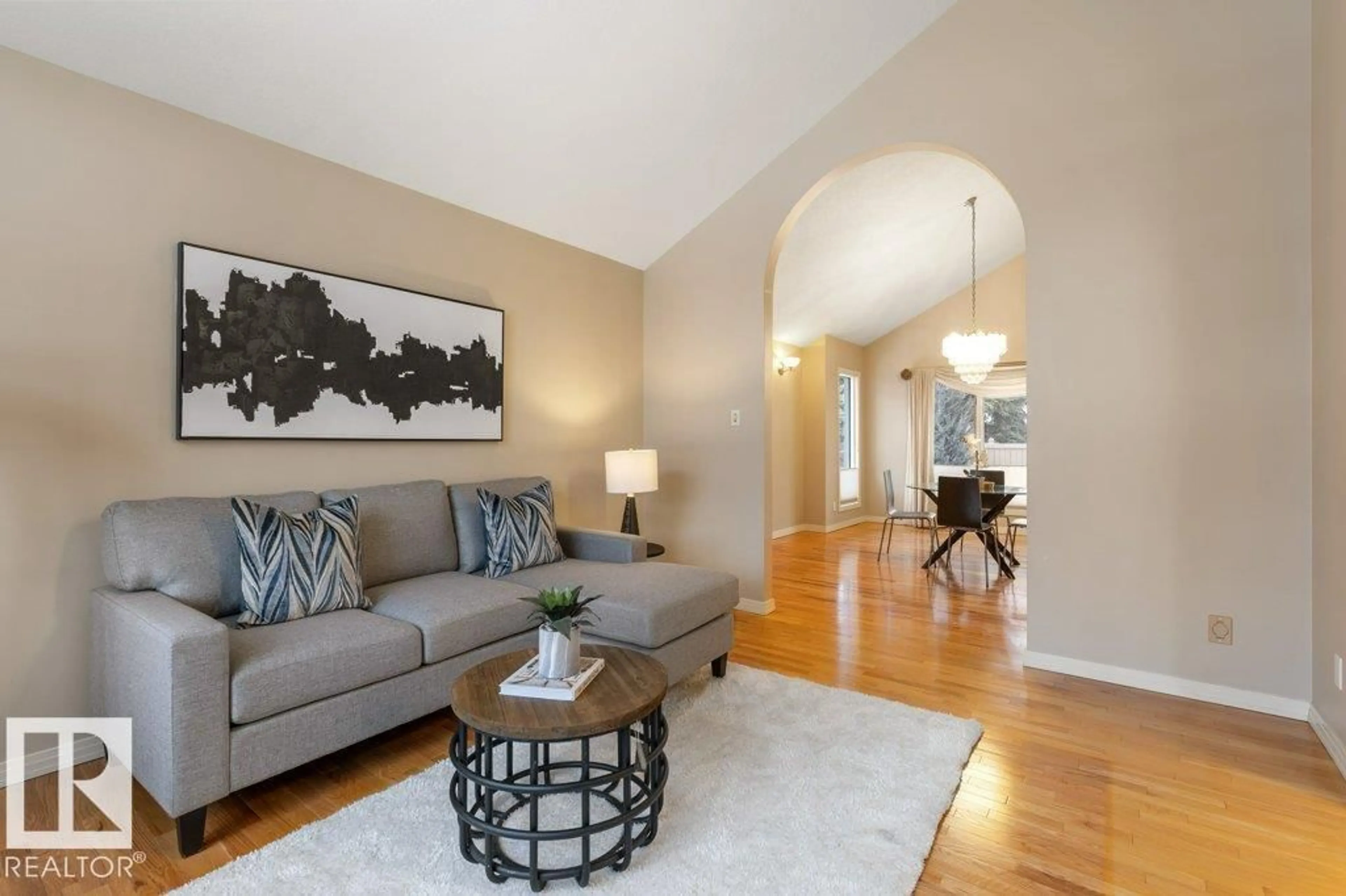 Living room with furniture, wood/laminate floor for 18 EASTBOURNE CL, St. Albert Alberta T8N5N5