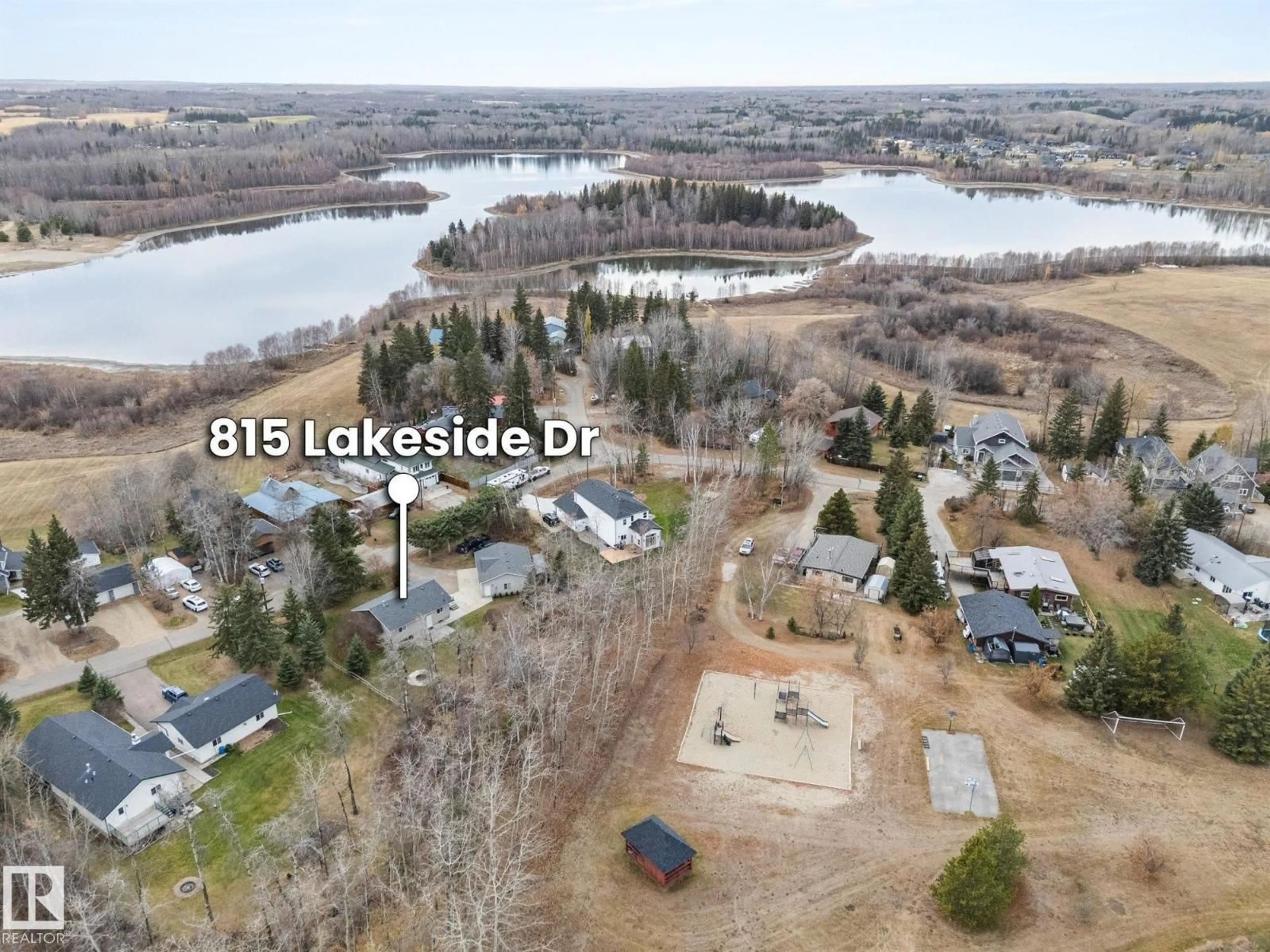A pic from outside/outdoor area/front of a property/back of a property/a pic from drone, water/lake/river/ocean view for 815 LAKESIDE DR, Rural Parkland County Alberta T7Z2T9