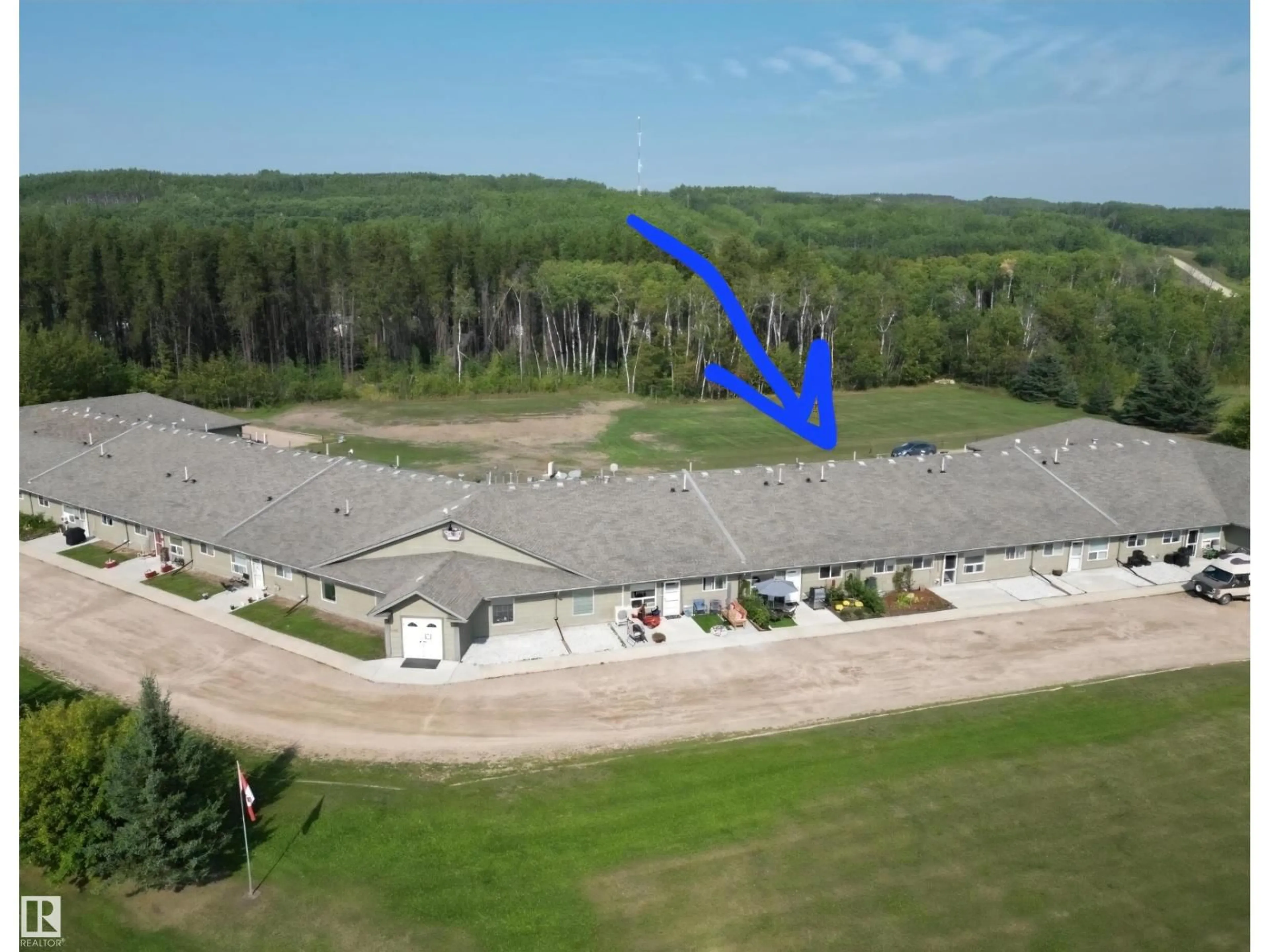 A pic from outside/outdoor area/front of a property/back of a property/a pic from drone, building for #3 - 5011 PINE AV, Cherry Grove Alberta T0A0T0