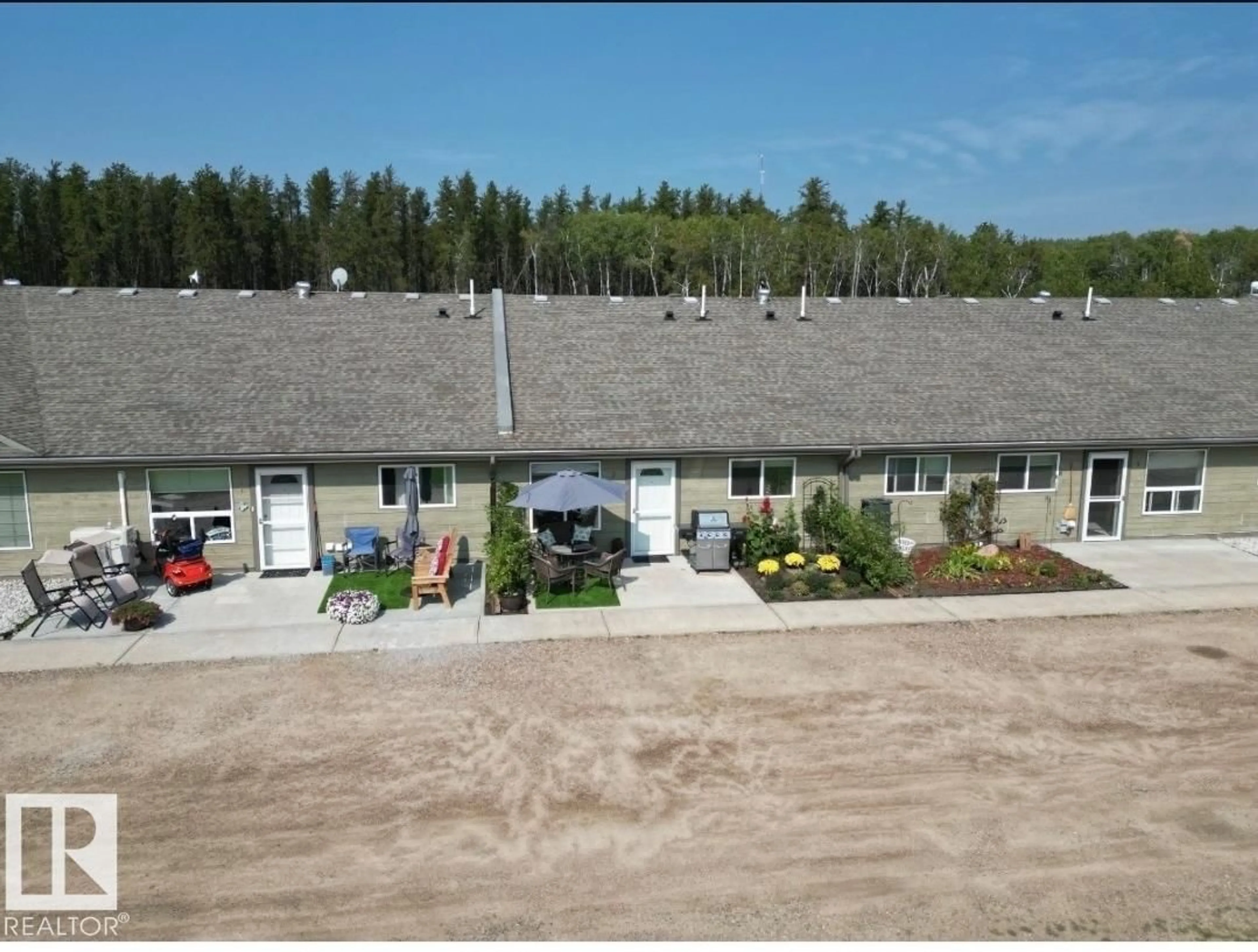 A pic from outside/outdoor area/front of a property/back of a property/a pic from drone, building for #3 - 5011 PINE AV, Cherry Grove Alberta T0A0T0