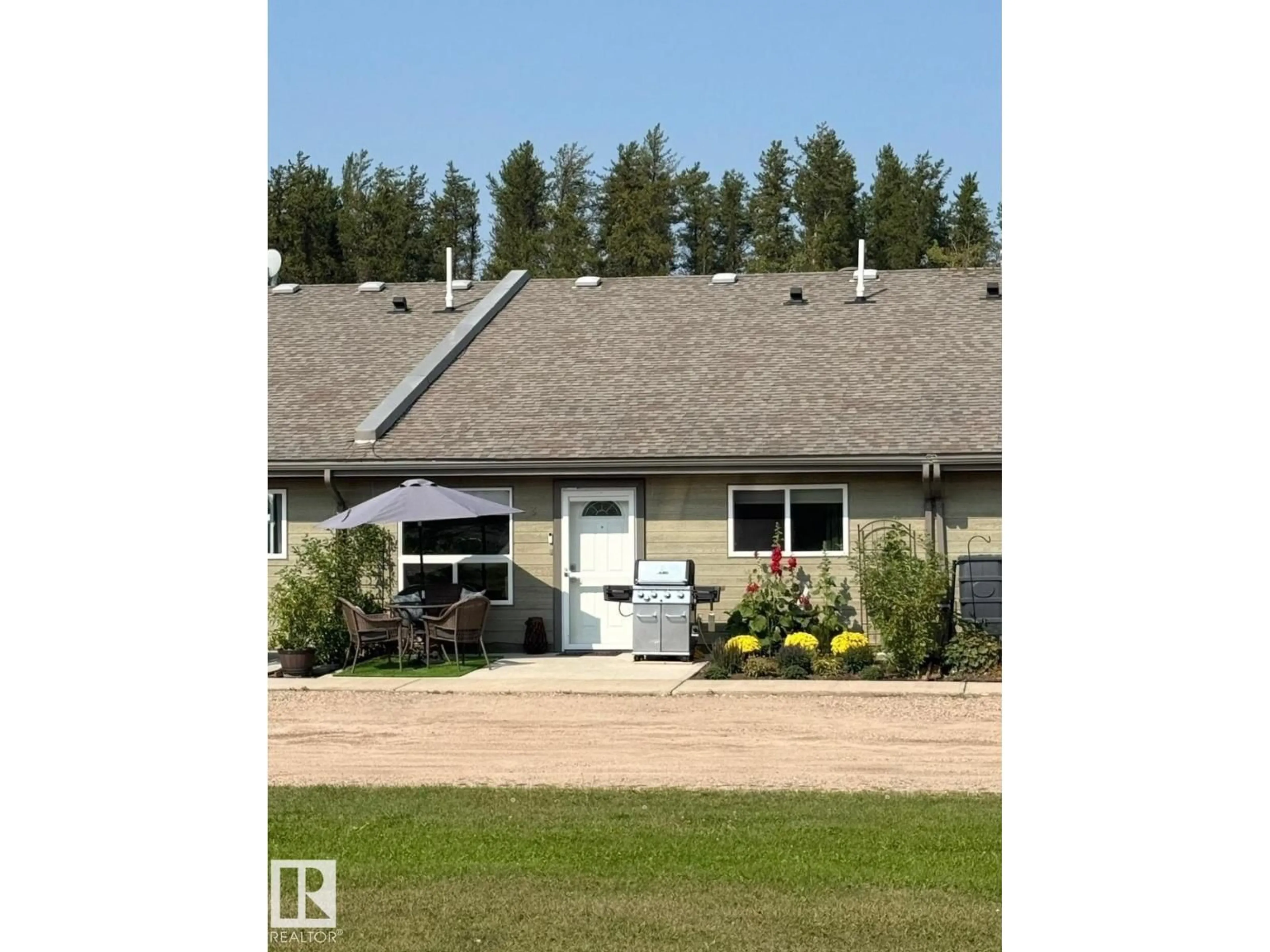 A pic from outside/outdoor area/front of a property/back of a property/a pic from drone, building for #3 - 5011 PINE AV, Cherry Grove Alberta T0A0T0