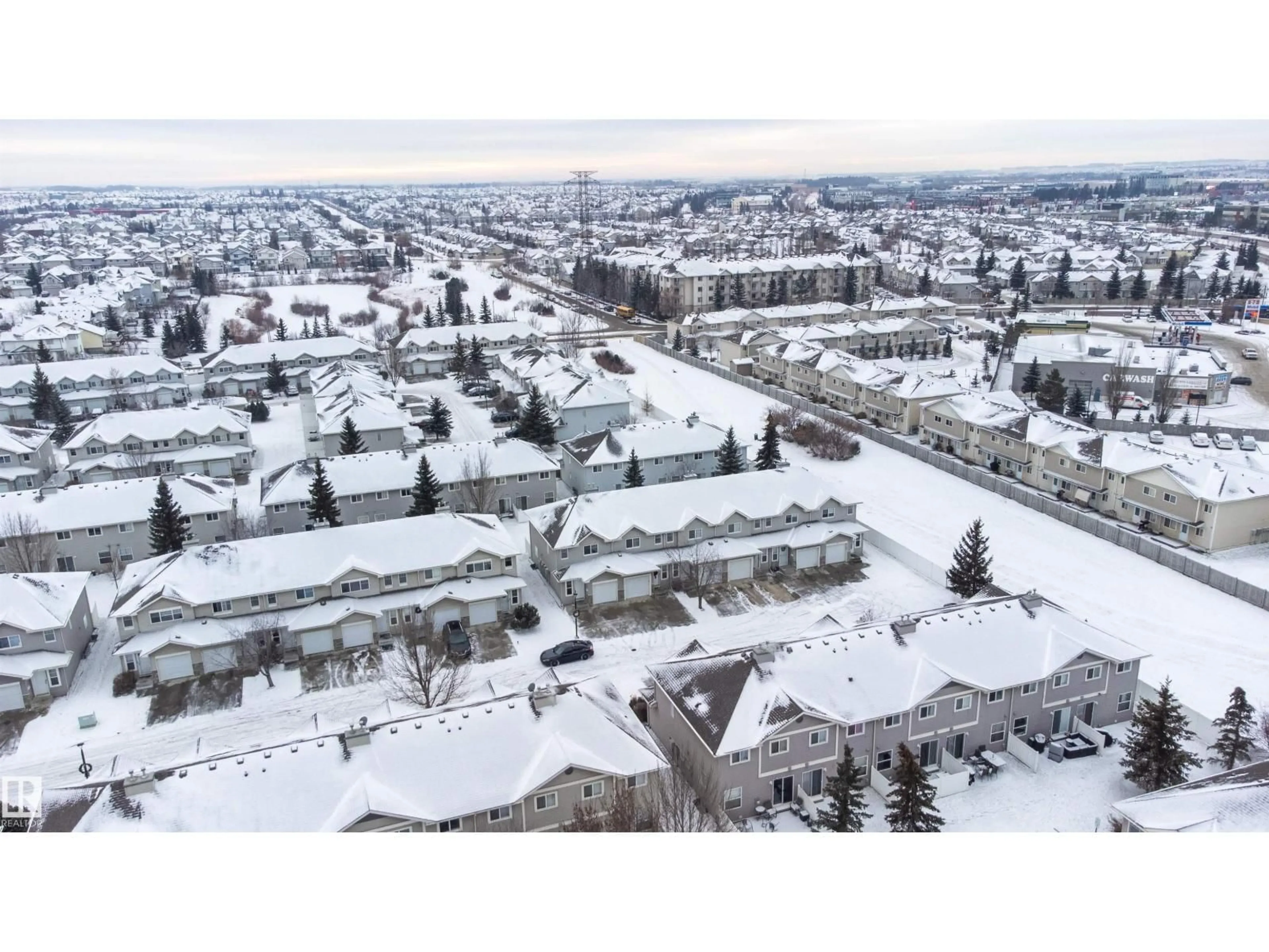 A pic from outside/outdoor area/front of a property/back of a property/a pic from drone, street for #111 - 230 EDWARDS DR, Edmonton Alberta T6X1G7