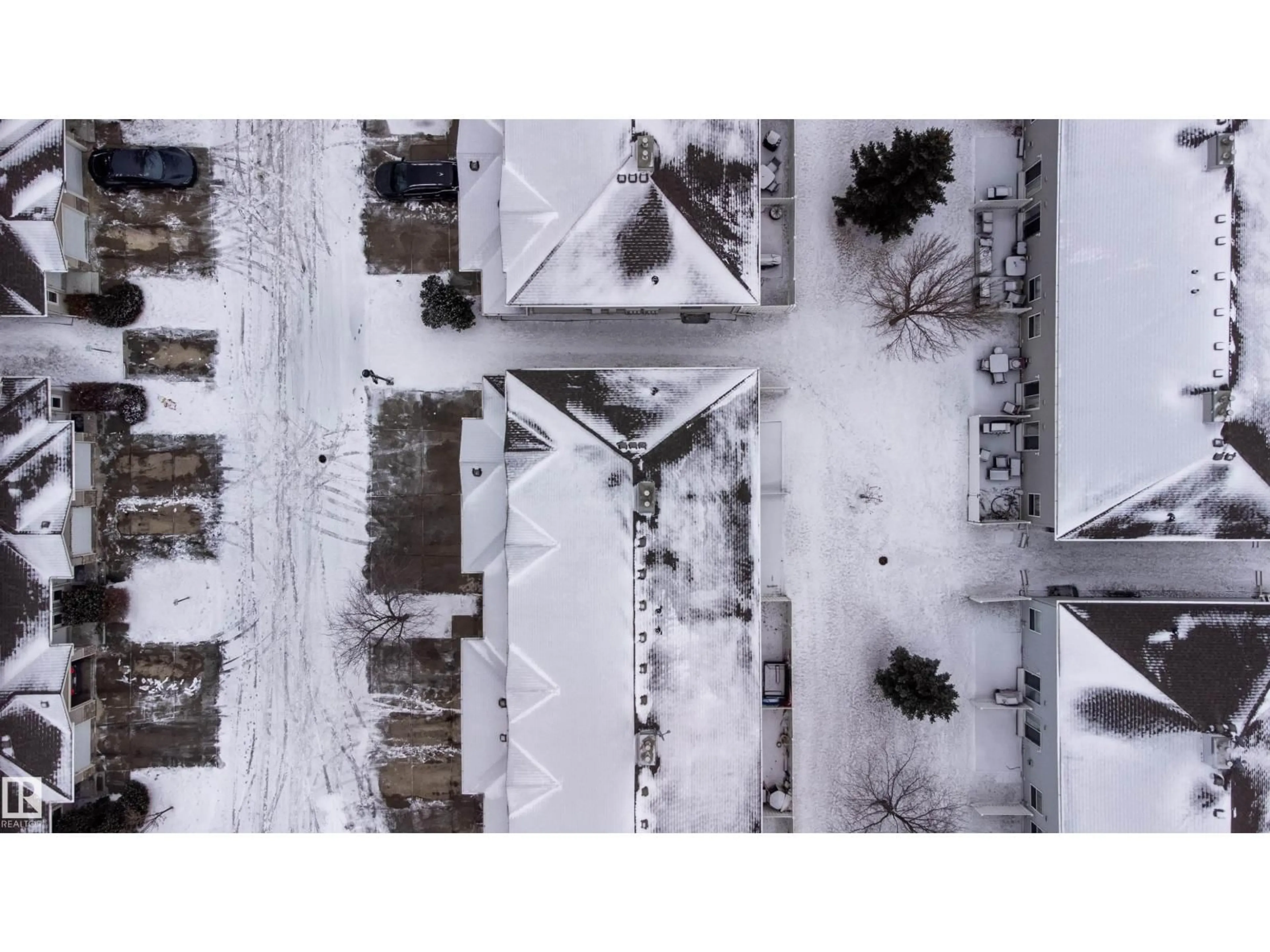 A pic from outside/outdoor area/front of a property/back of a property/a pic from drone, street for #111 - 230 EDWARDS DR, Edmonton Alberta T6X1G7