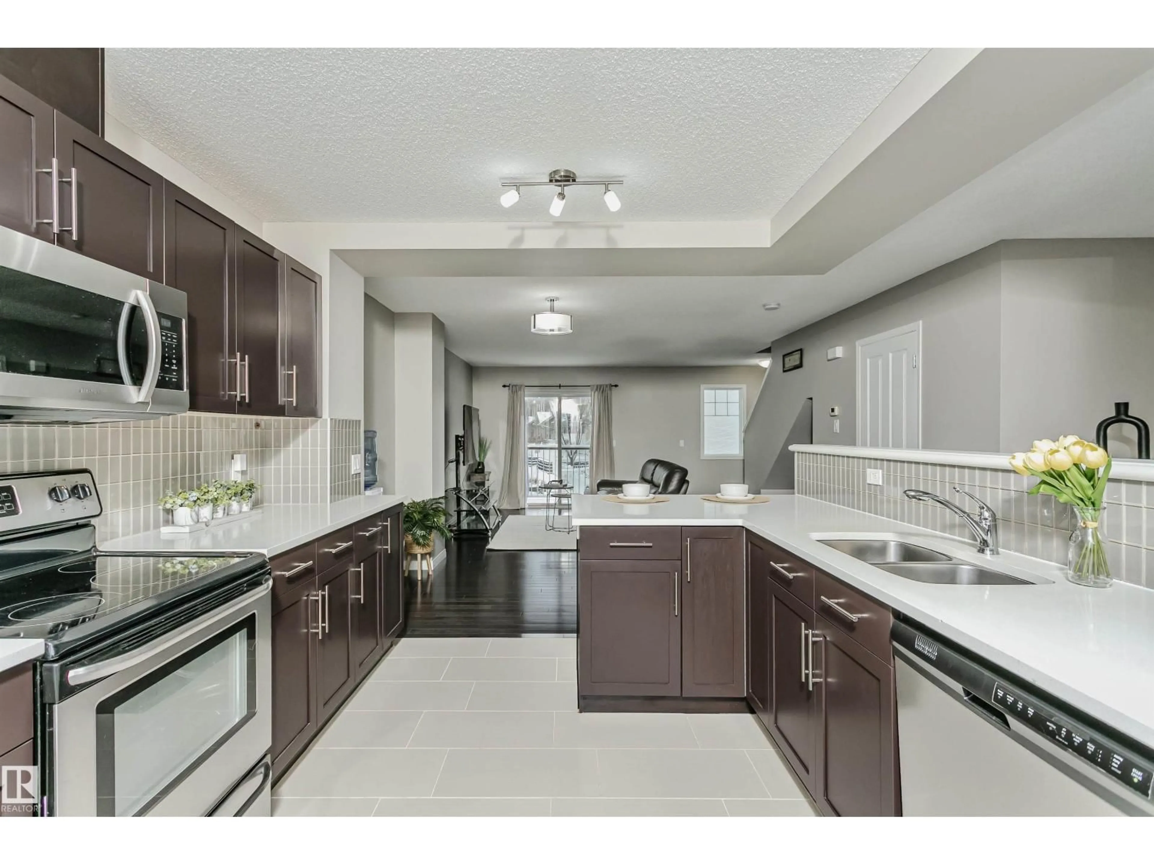 Open concept kitchen, ceramic/tile floor for 460 - 38 HEMINGWY RD, Edmonton Alberta T6M0M5