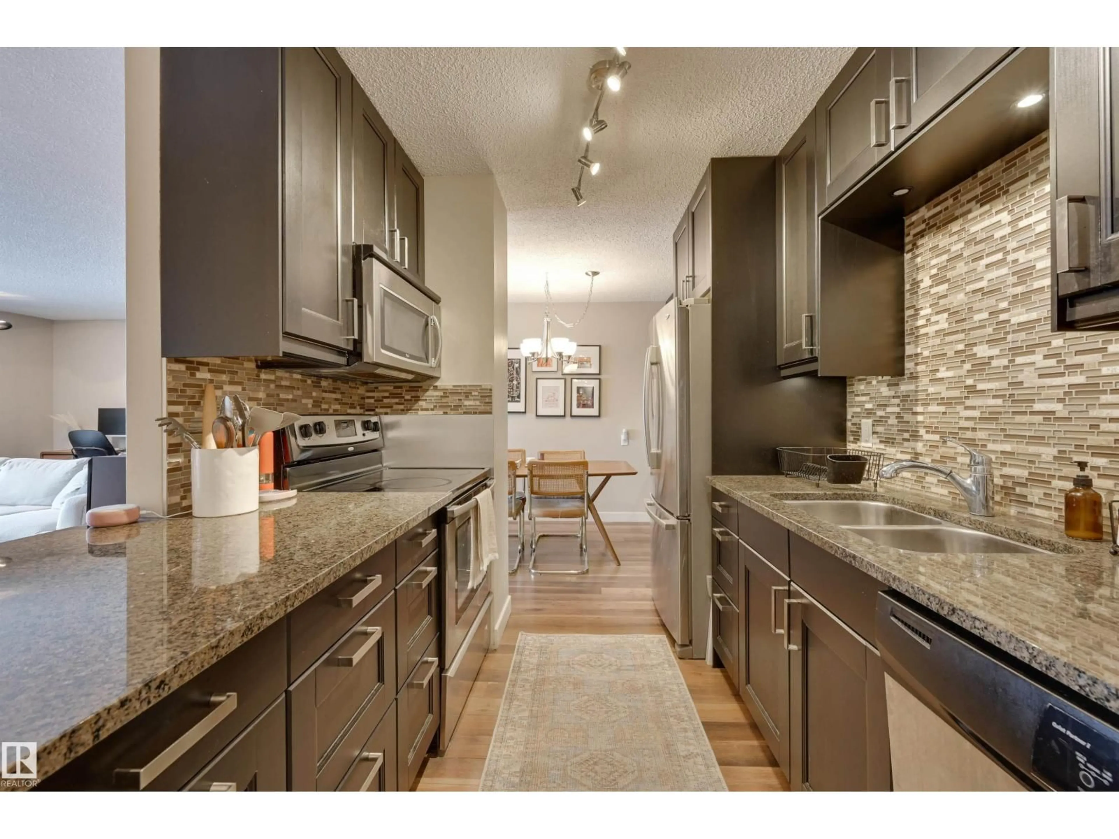 Open concept kitchen, unknown for #406 - 12141 JASPER AV, Edmonton Alberta T5N3X8