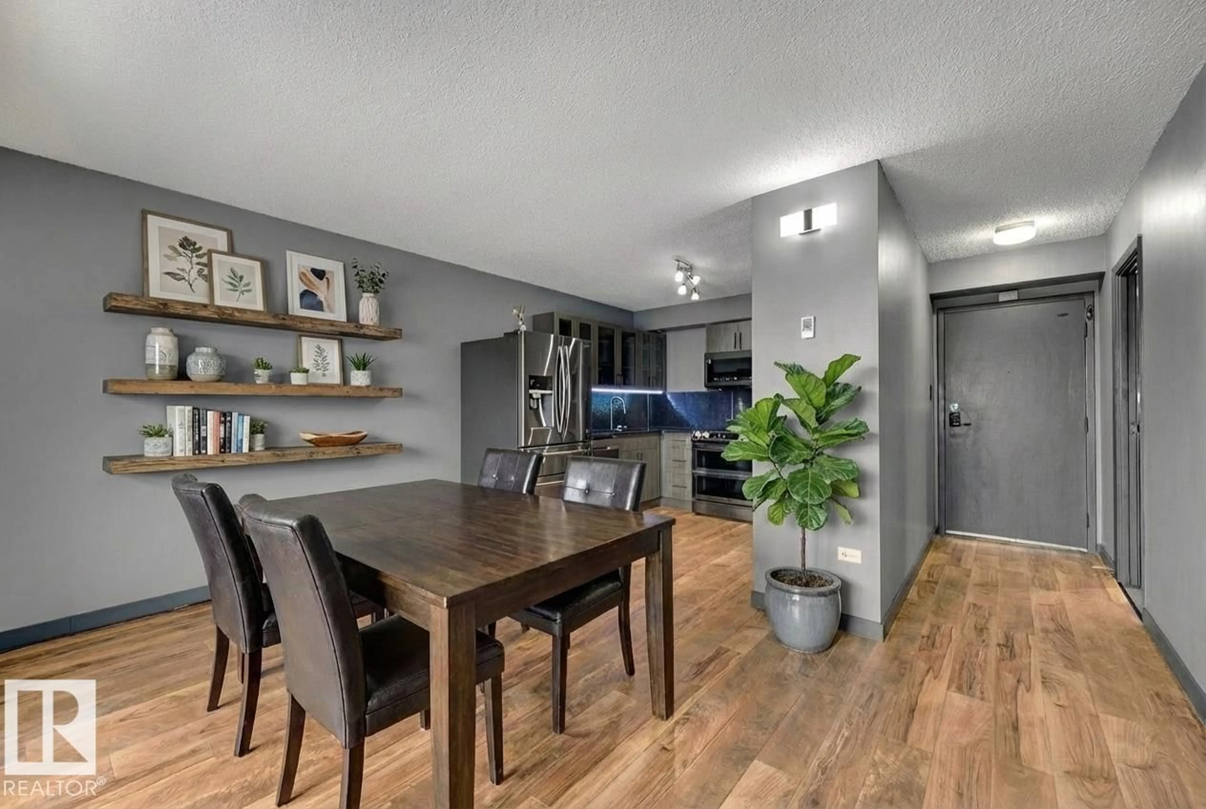 Open concept kitchen, wood/laminate floor for 10150 - 1702 117 ST, Edmonton Alberta T5K2J2