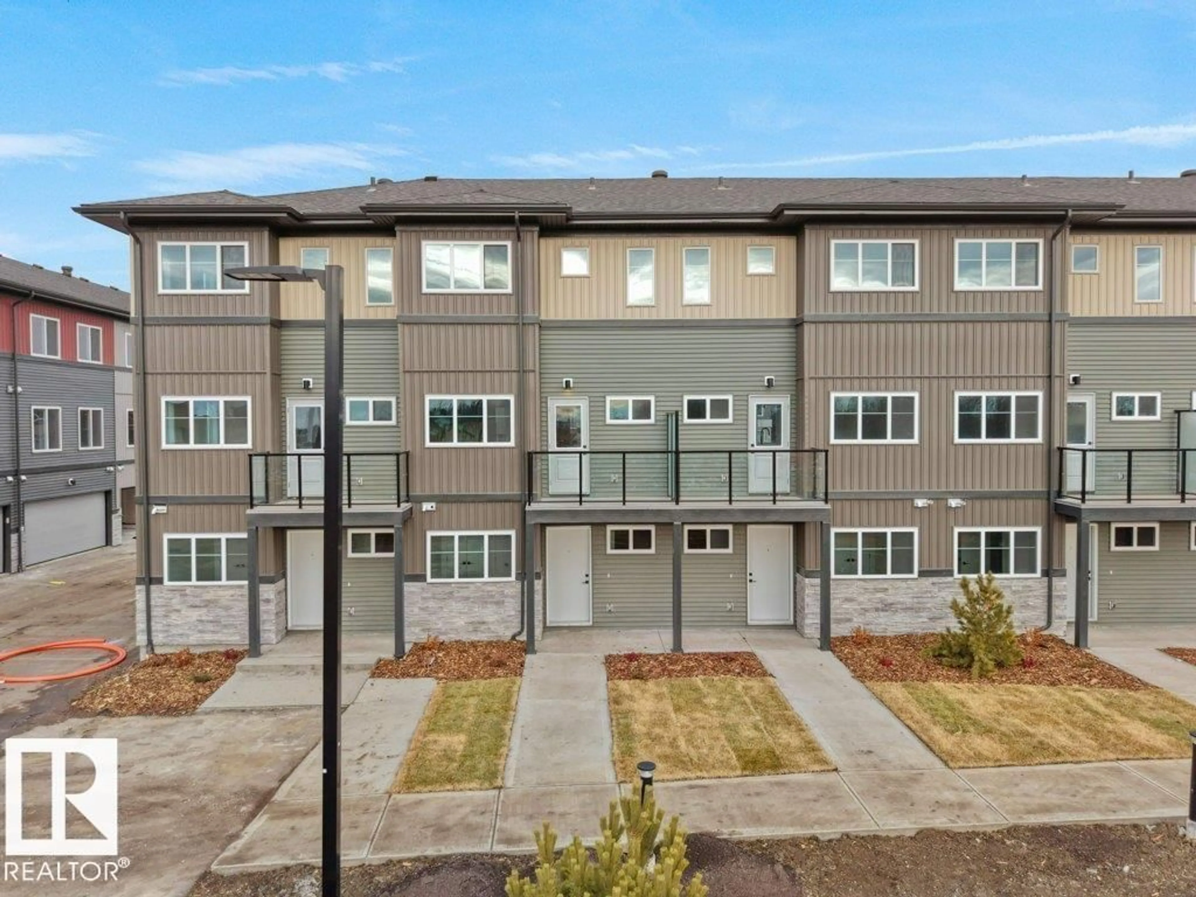 A pic from outside/outdoor area/front of a property/back of a property/a pic from drone, street for #66 - 18120 28 AV, Edmonton Alberta T6W4V2