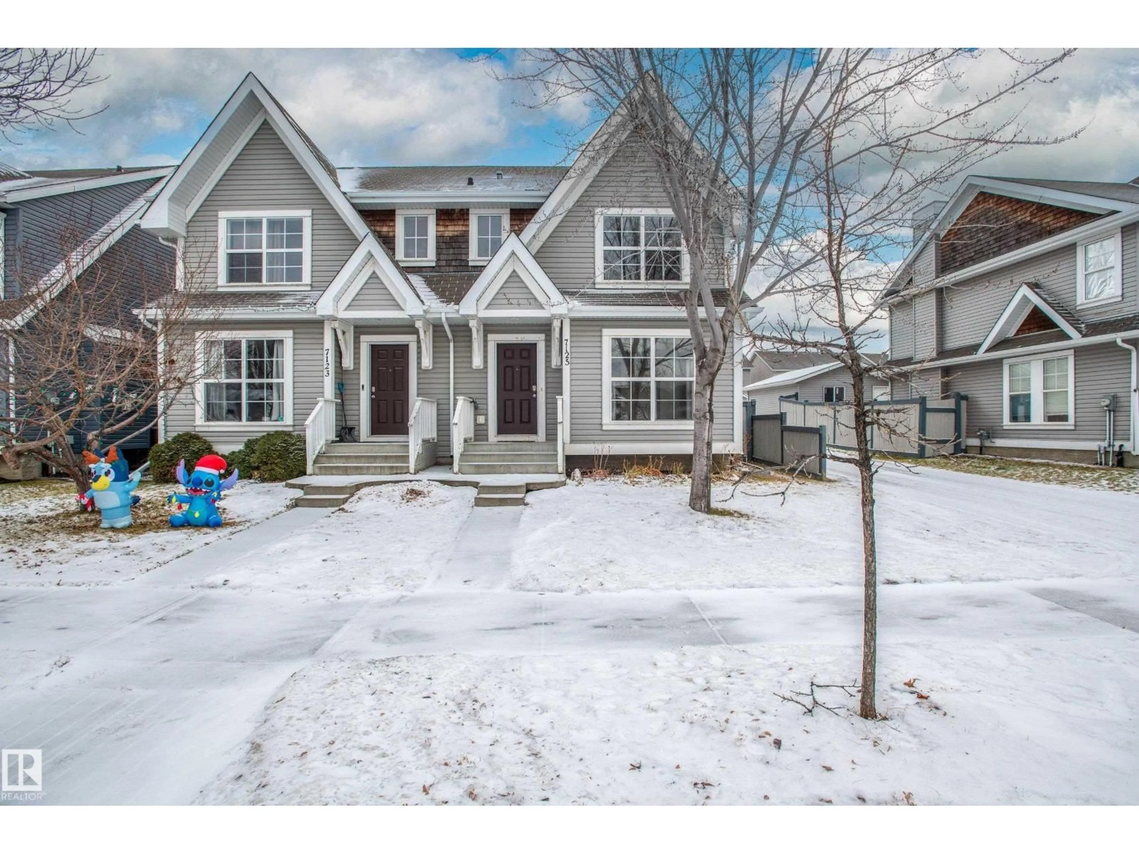 Home with vinyl exterior material, street for 7125 21 AV, Edmonton Alberta T6X0L5