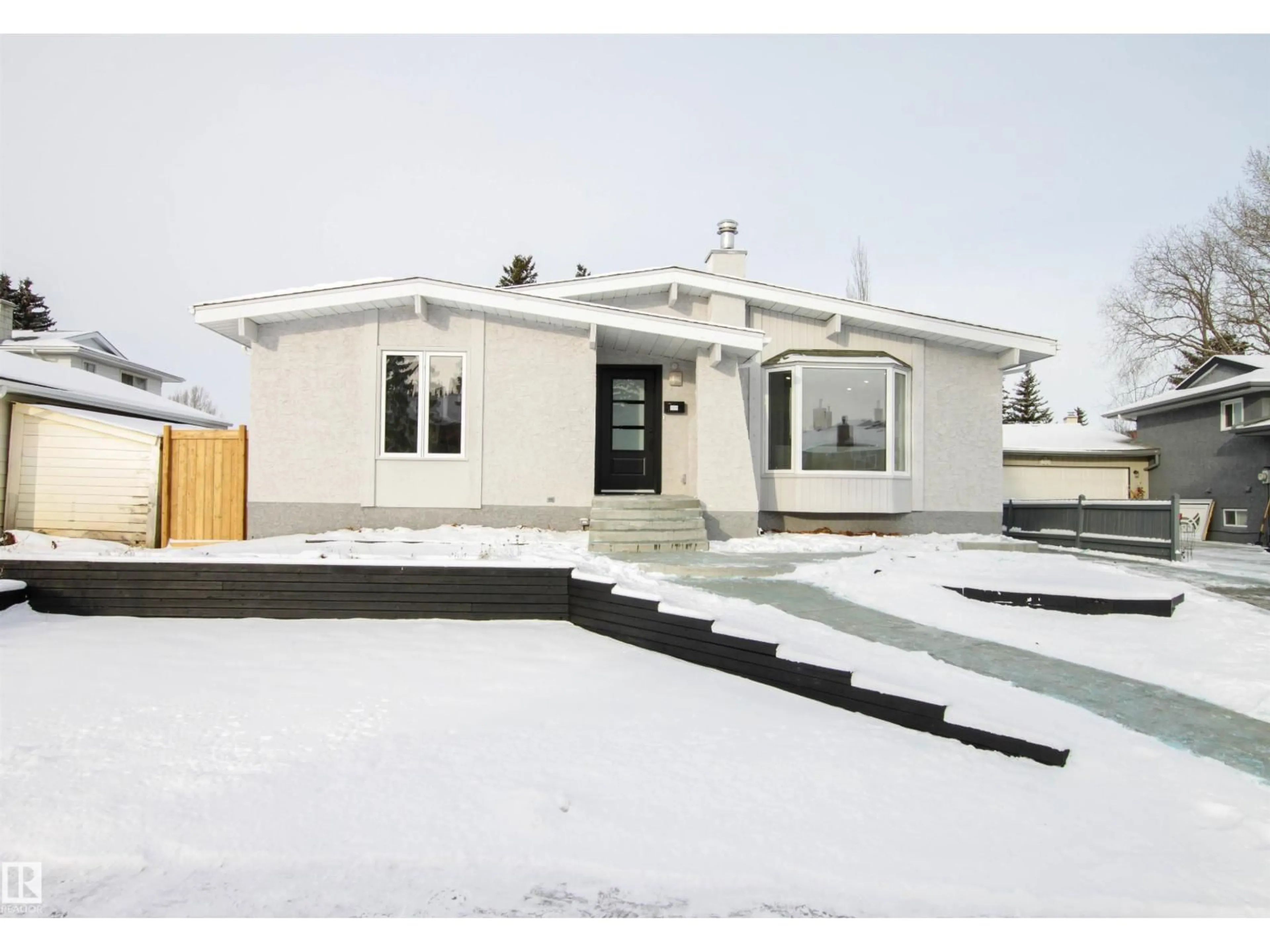 Home with vinyl exterior material, street for NW - 18616 66 AV, Edmonton Alberta T5T2M4