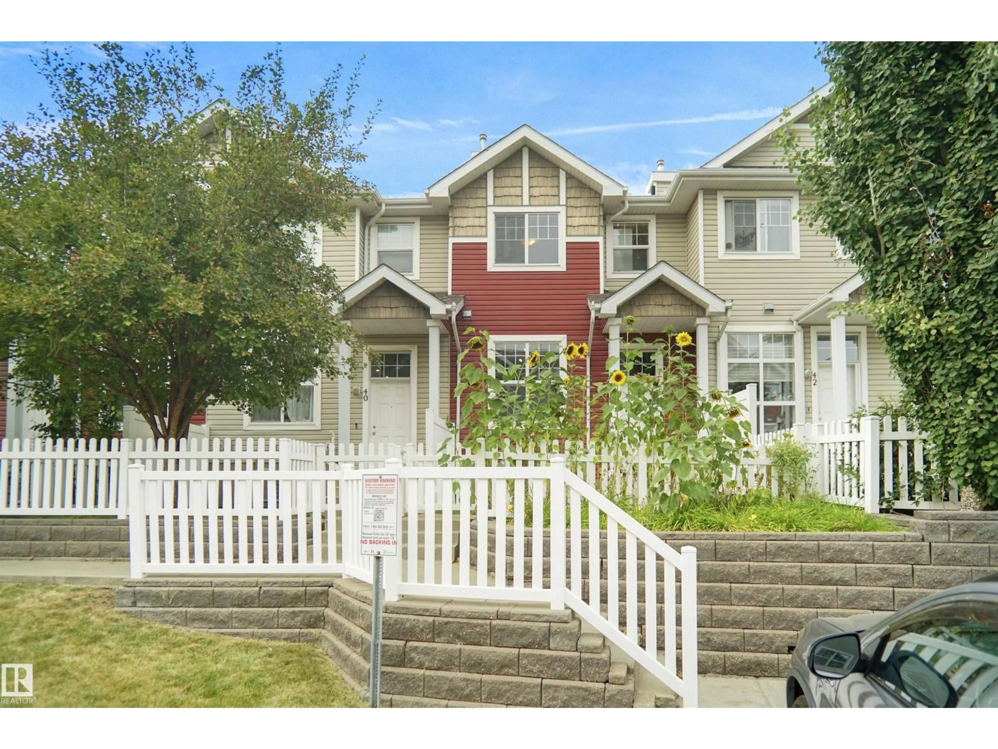 Home with vinyl exterior material, street for #41 - 5604 199 ST, Edmonton Alberta T6M2Z9