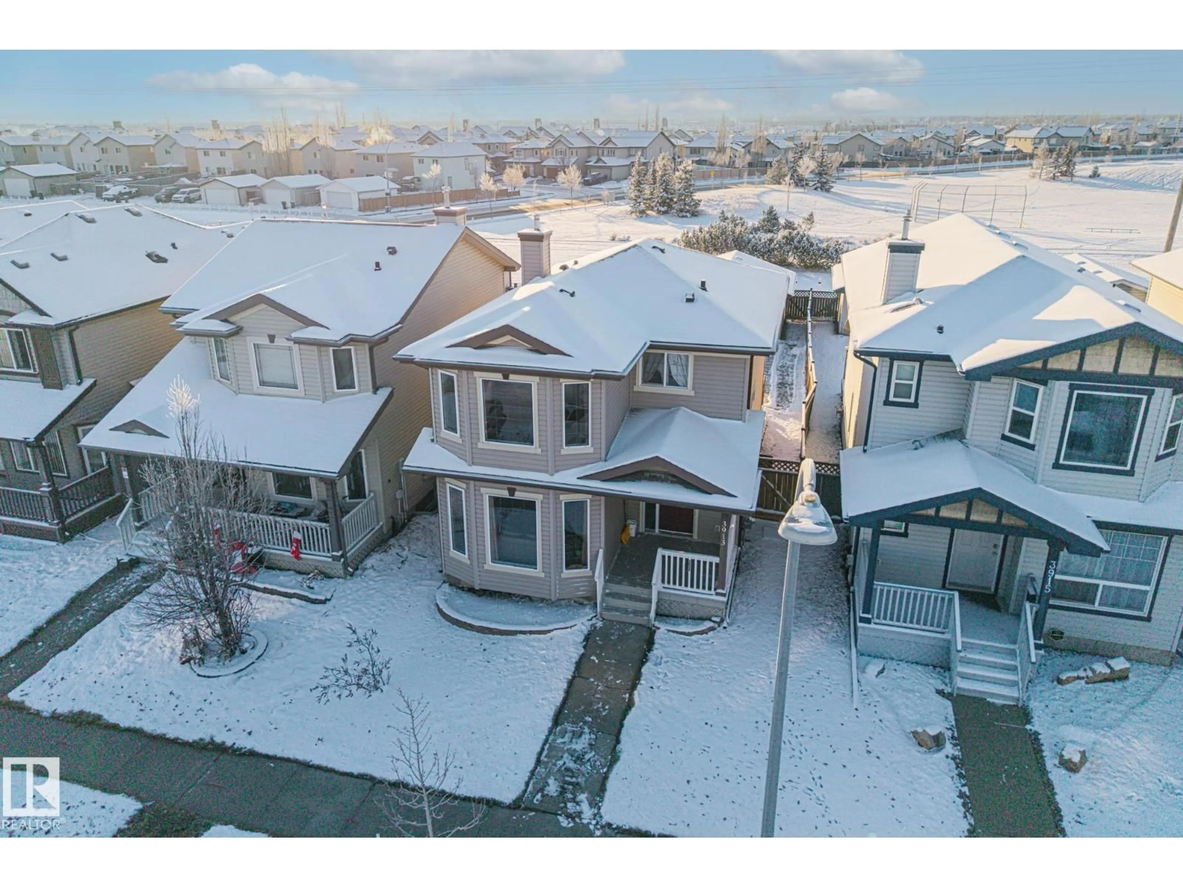 A pic from outside/outdoor area/front of a property/back of a property/a pic from drone, street for NW - 3913 159 AV, Edmonton Alberta T5Y3J9