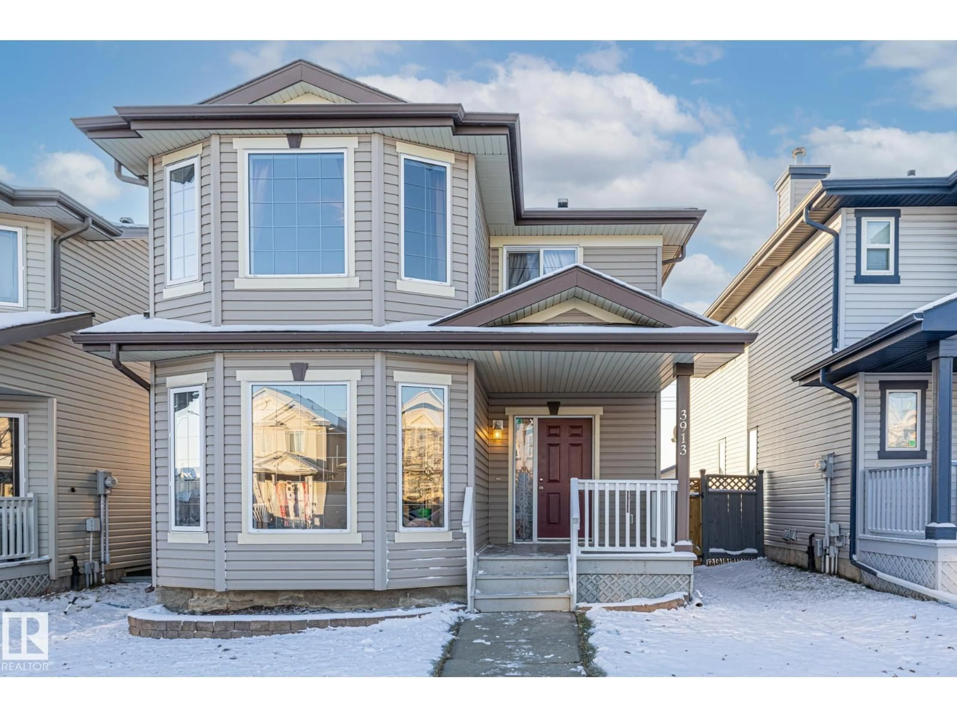 Home with vinyl exterior material, street for NW - 3913 159 AV, Edmonton Alberta T5Y3J9