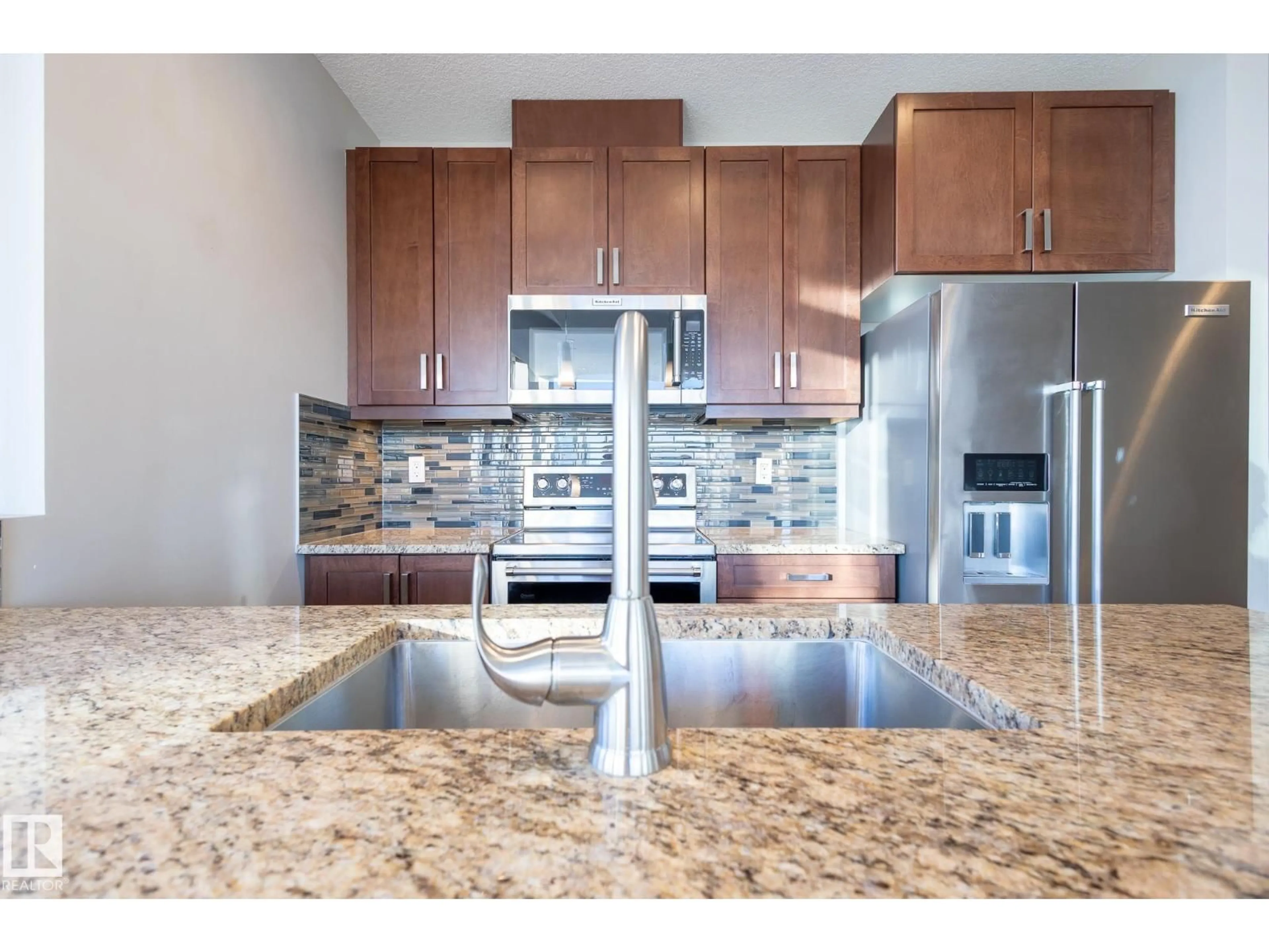 Open concept kitchen, ceramic/tile floor for 10238 - 2501 103 ST, Edmonton Alberta T5J0G6