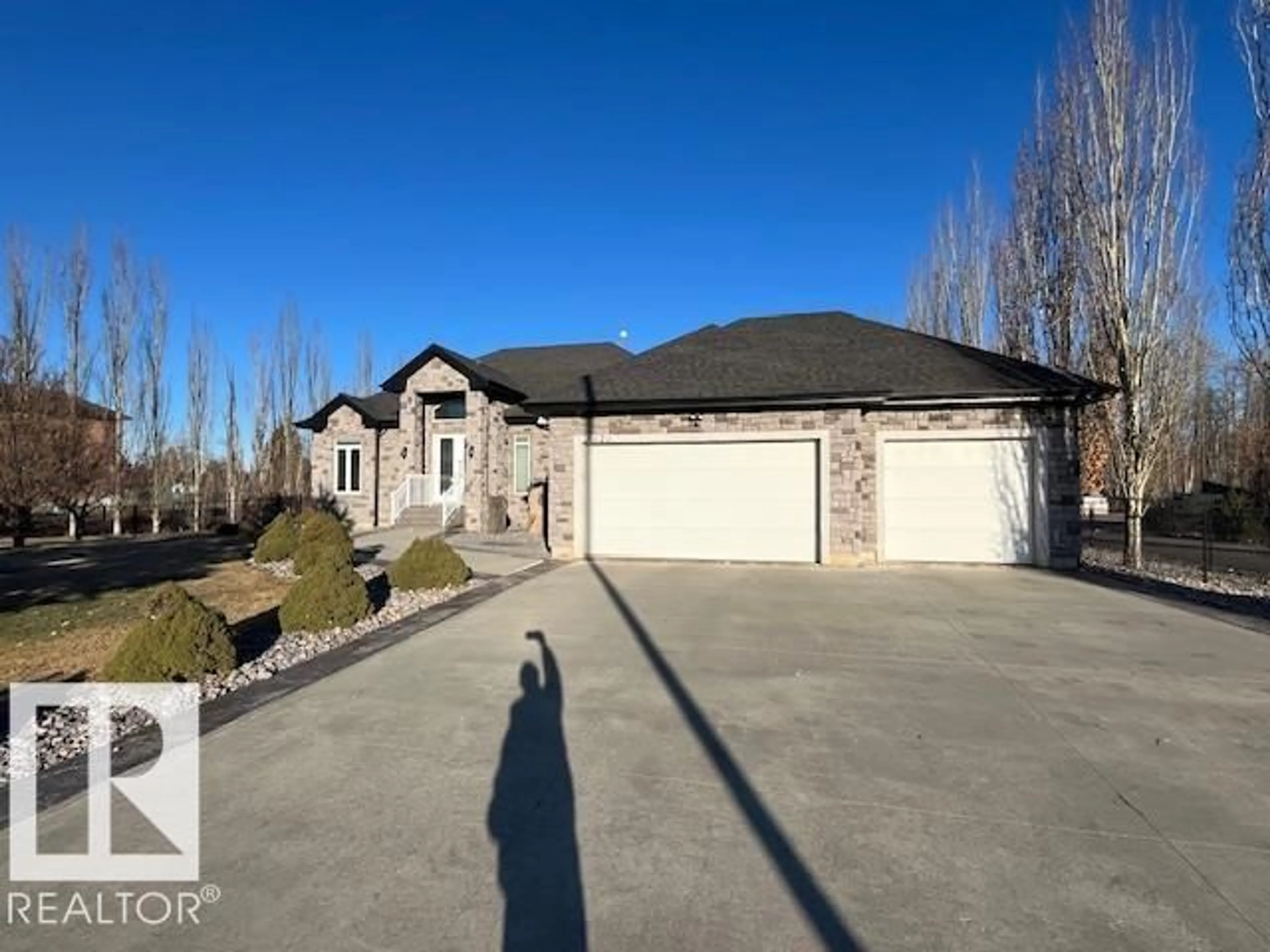A pic from outside/outdoor area/front of a property/back of a property/a pic from drone, street for SW - 21428 25 AV, Edmonton Alberta T6M0E1