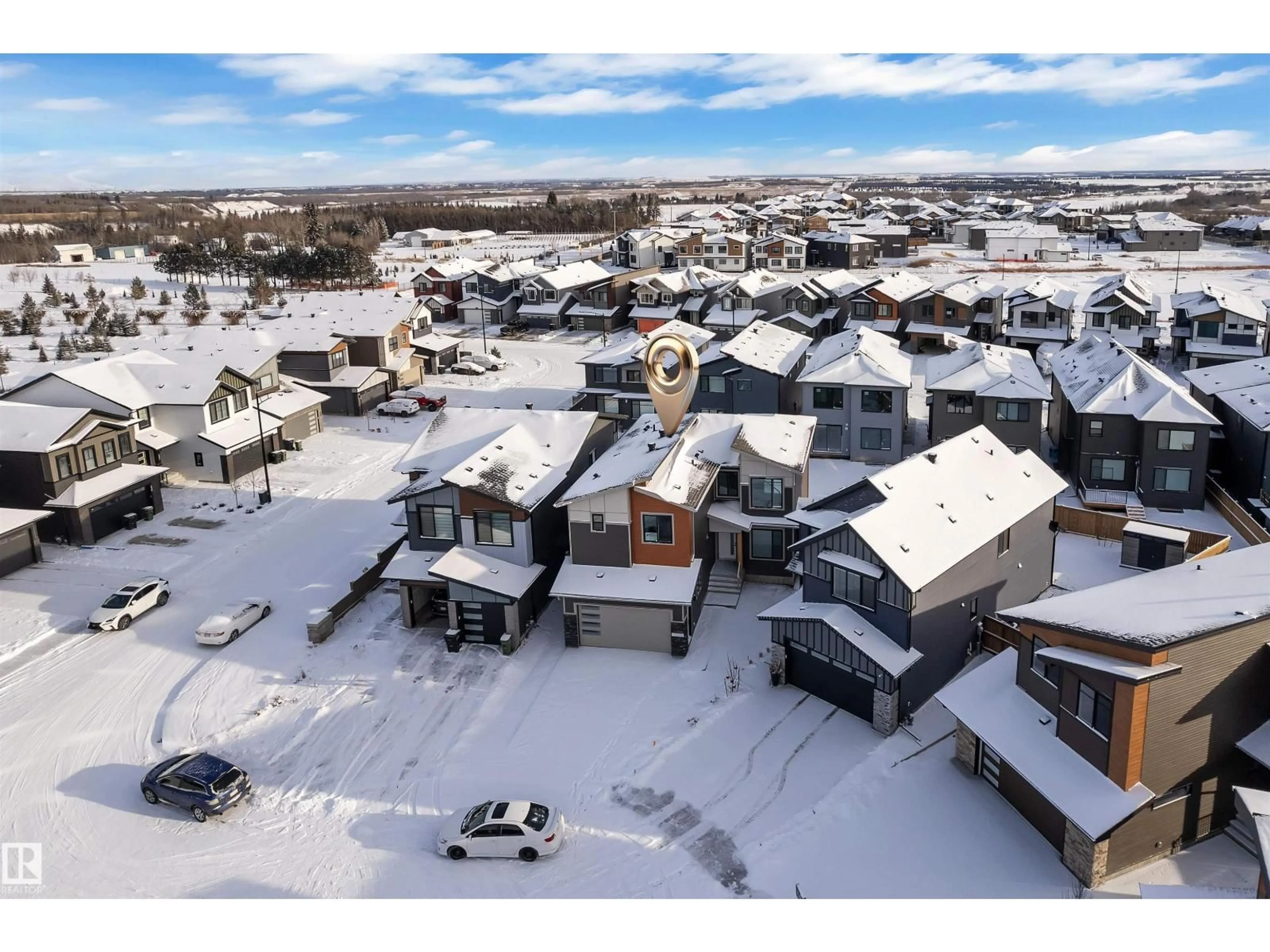 A pic from outside/outdoor area/front of a property/back of a property/a pic from drone, street for NE - 247 166 AV, Edmonton Alberta T5Y4J2