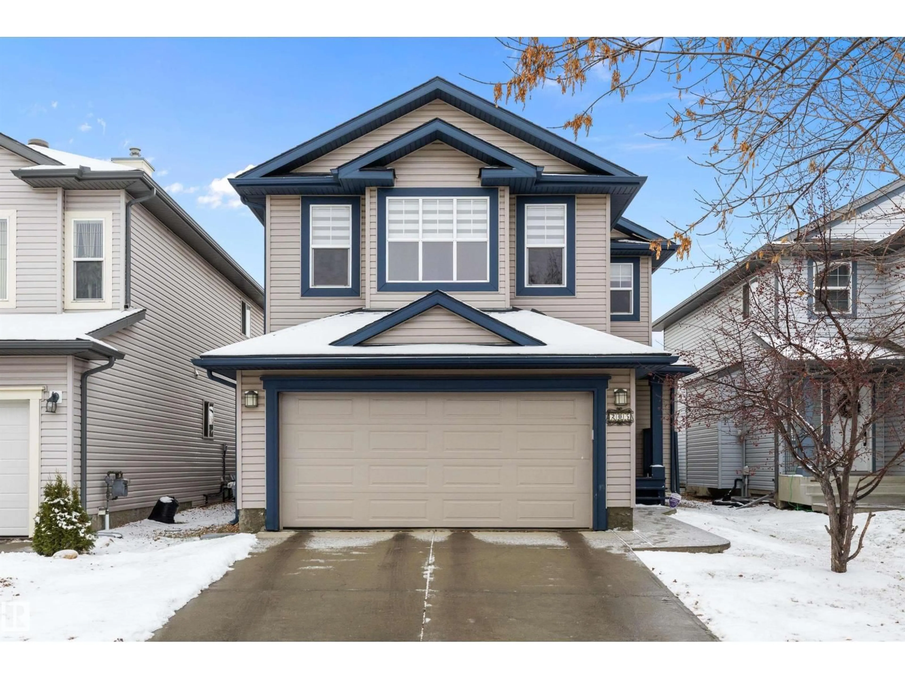 Home with vinyl exterior material, street for 205 MACEWAN RD, Edmonton Alberta T6W1R2