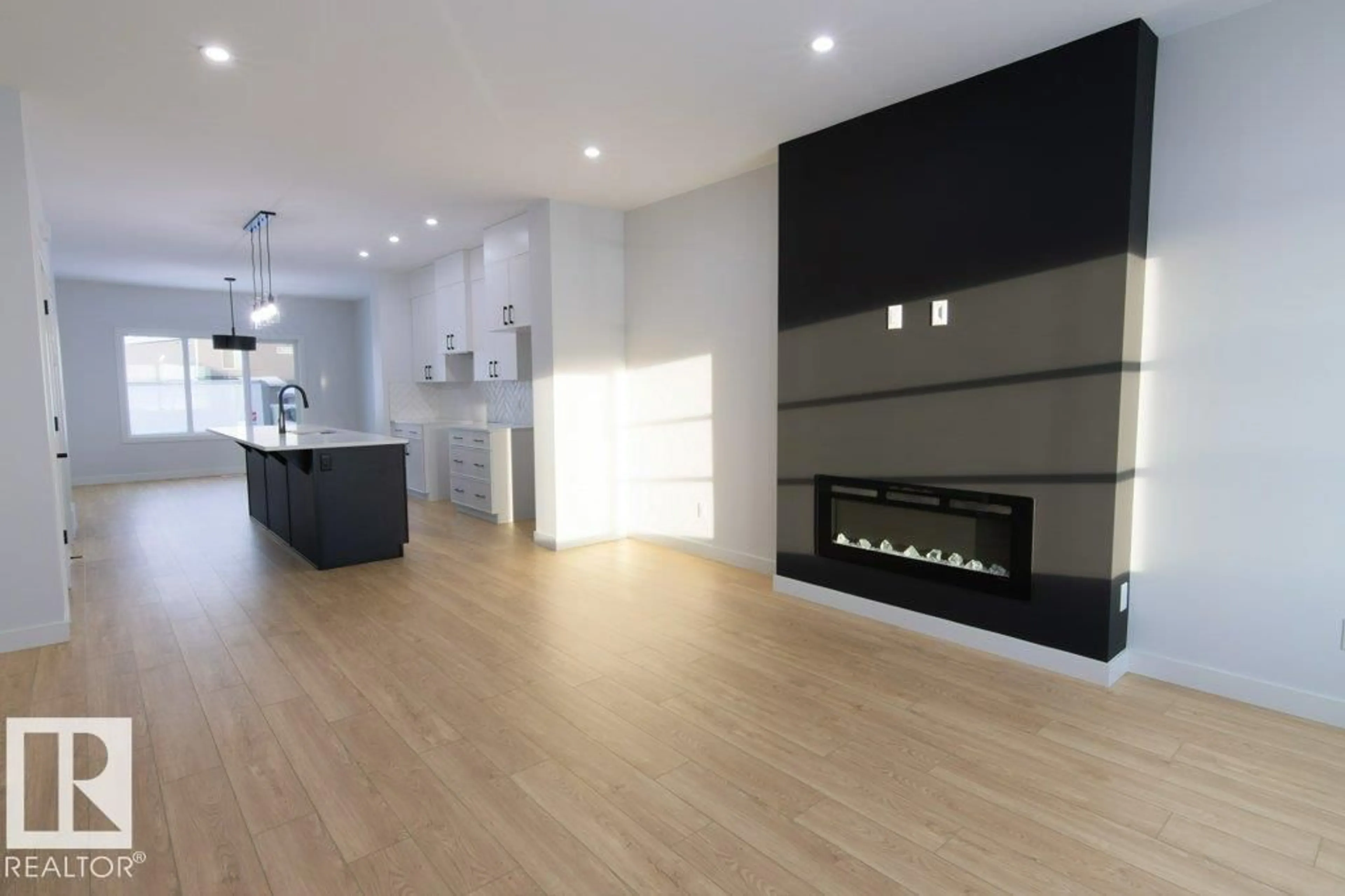 Open concept kitchen, wood/laminate floor for 760 MATTSON DR, Edmonton Alberta T6X1A3